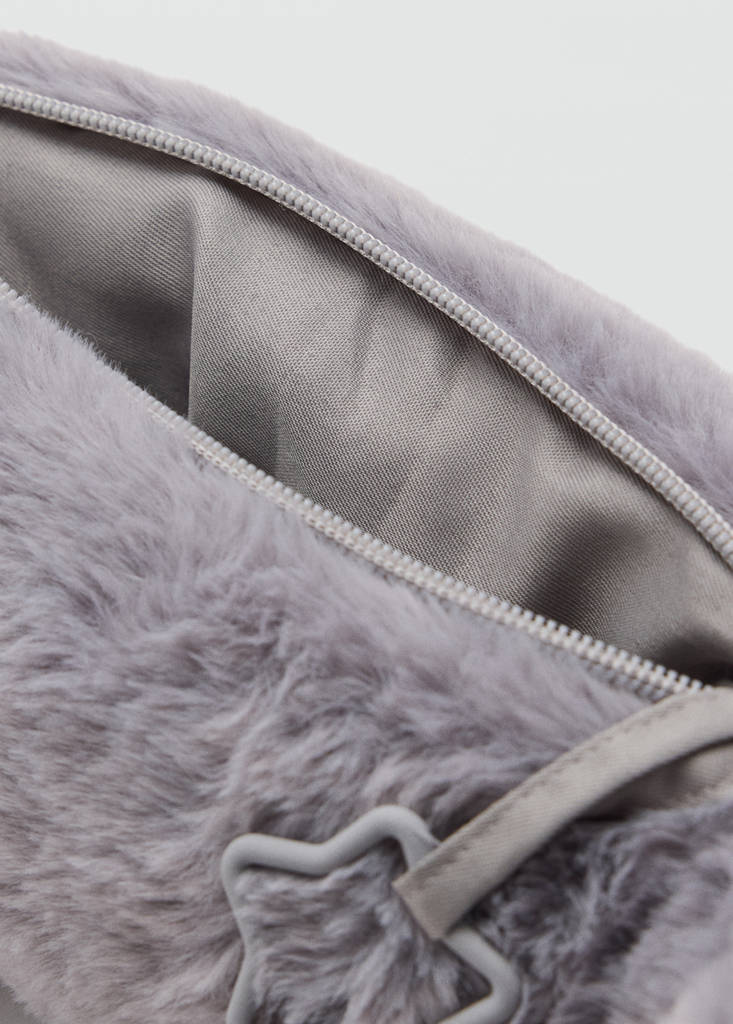 Dinosaur hair pouch