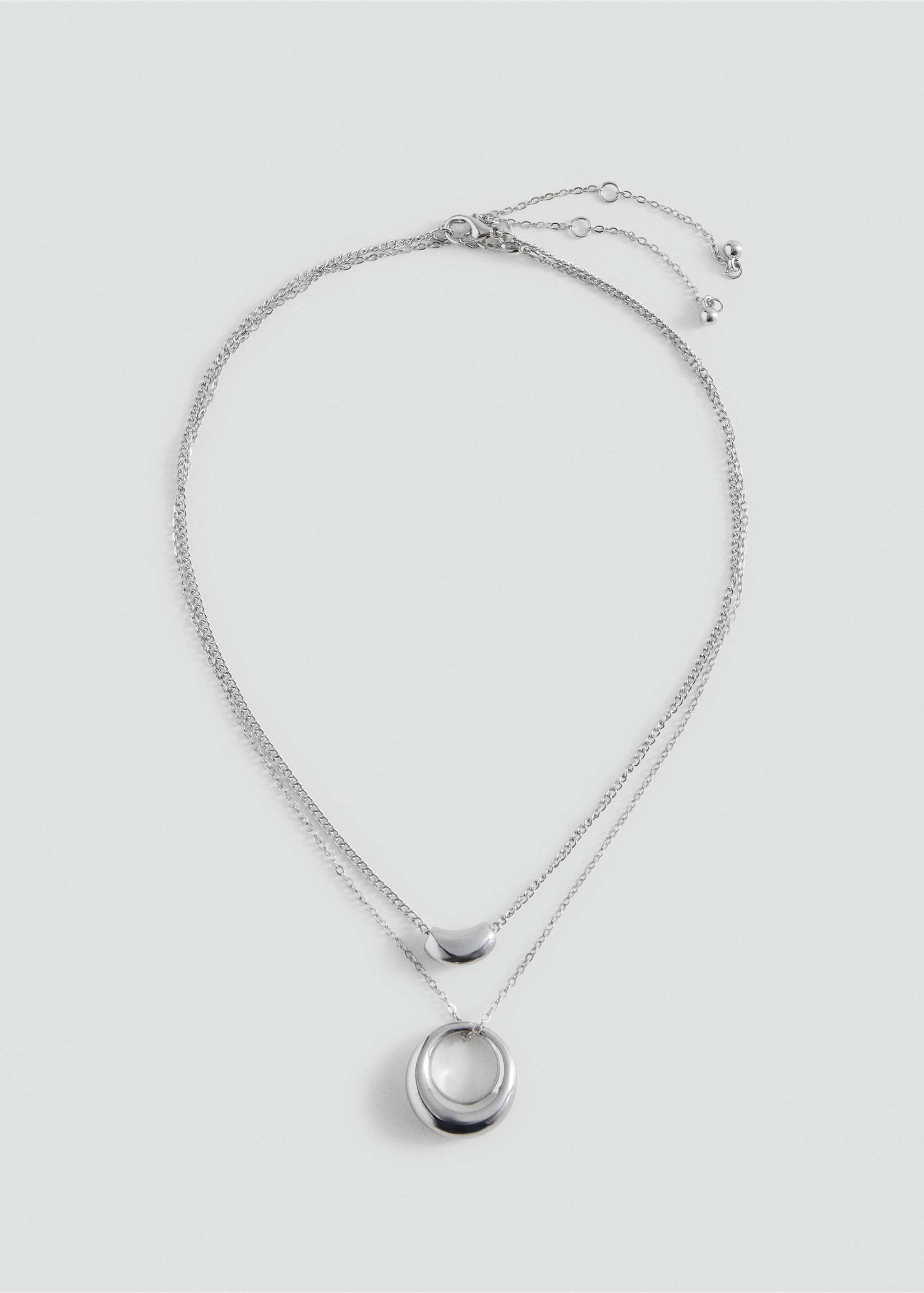 Silver-toned layered collar necklace with metallic pendant details., Silver. Ref: 37025187-00.