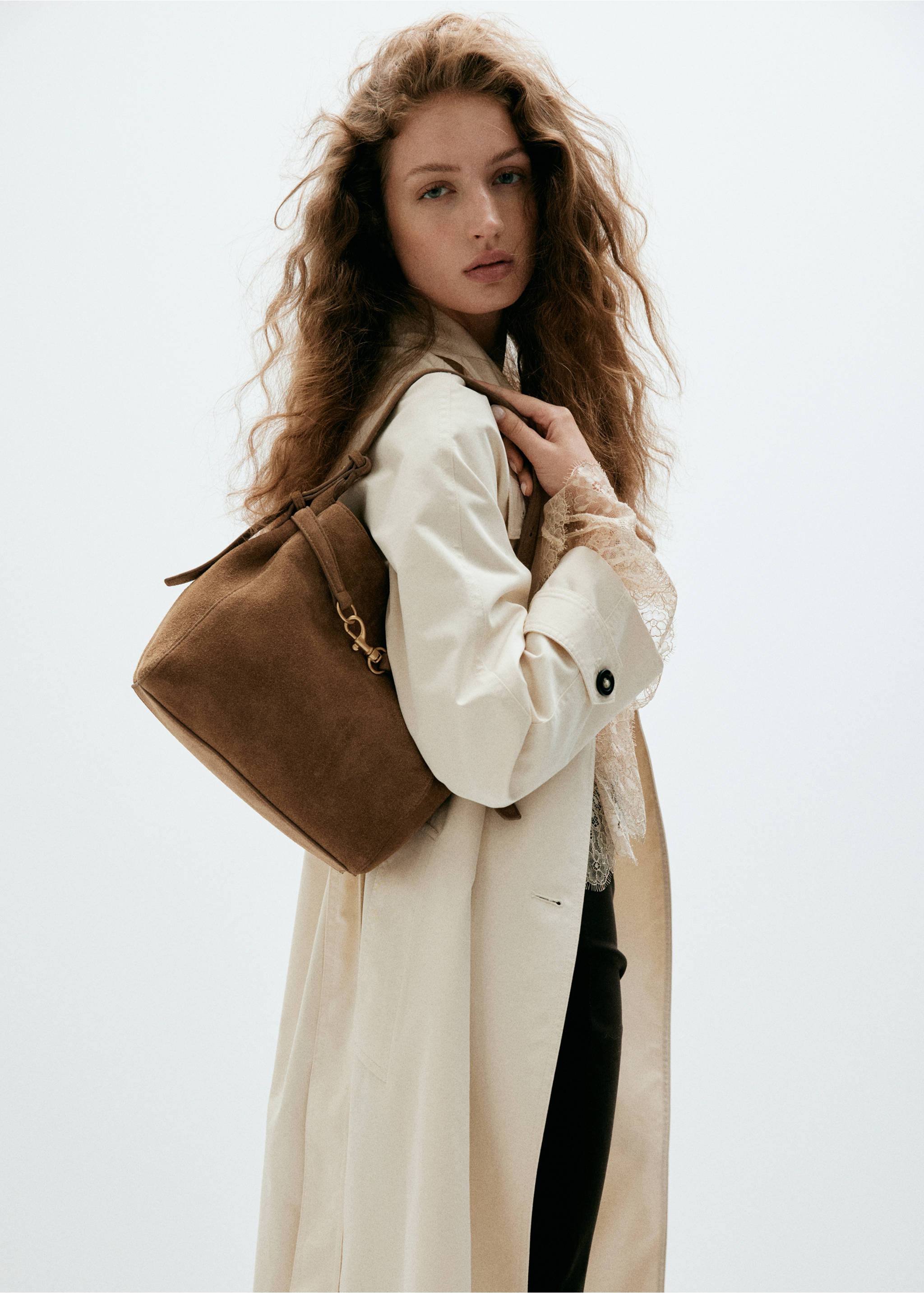 Suede leather bucket bag with equestrian detail - Details of the article 9, Medium Brown. Ref: 37026002-00.