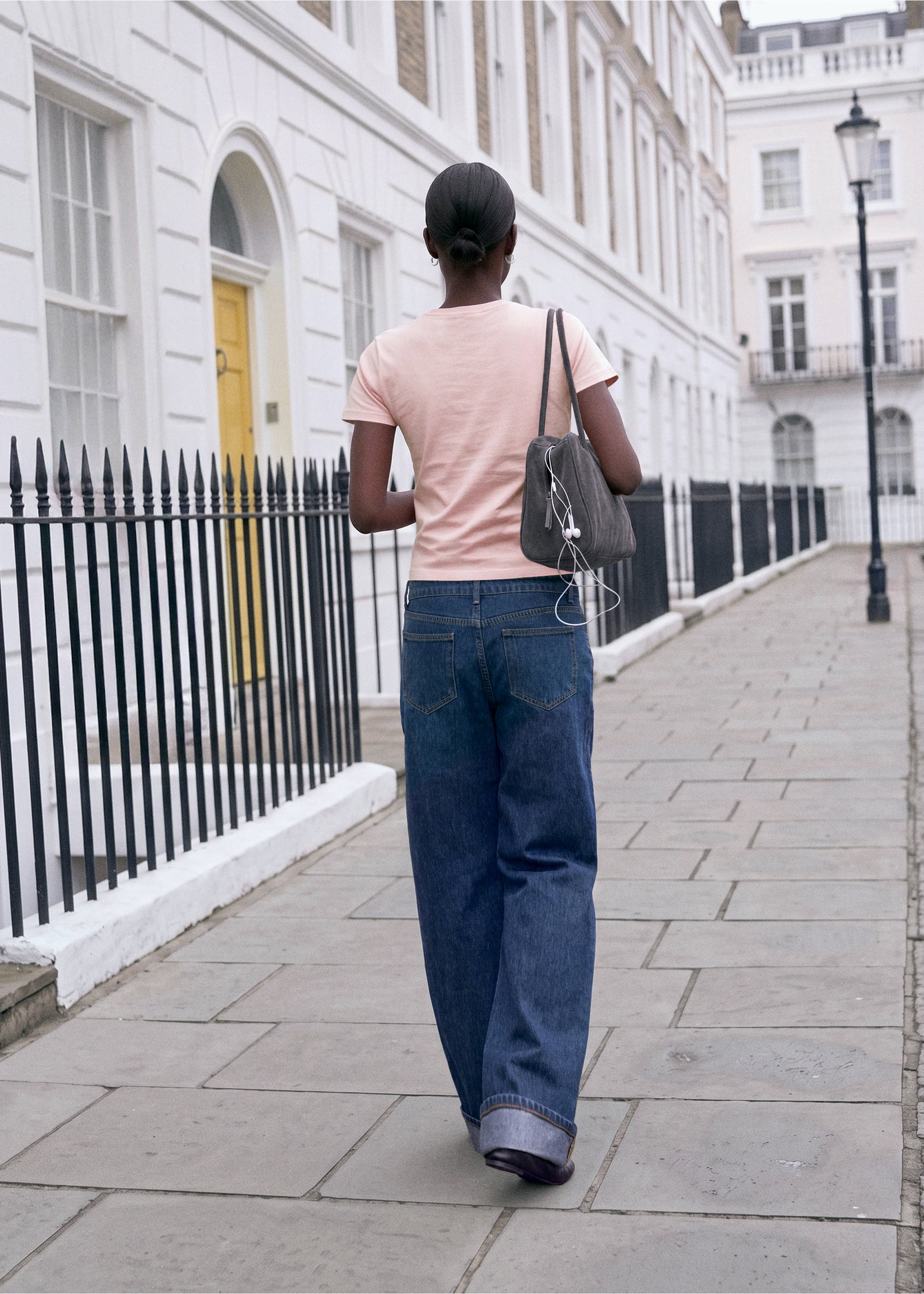 Pink t-shirt shown from the back, paired with blue denim trousers., Pink. Ref: 37026743-00.