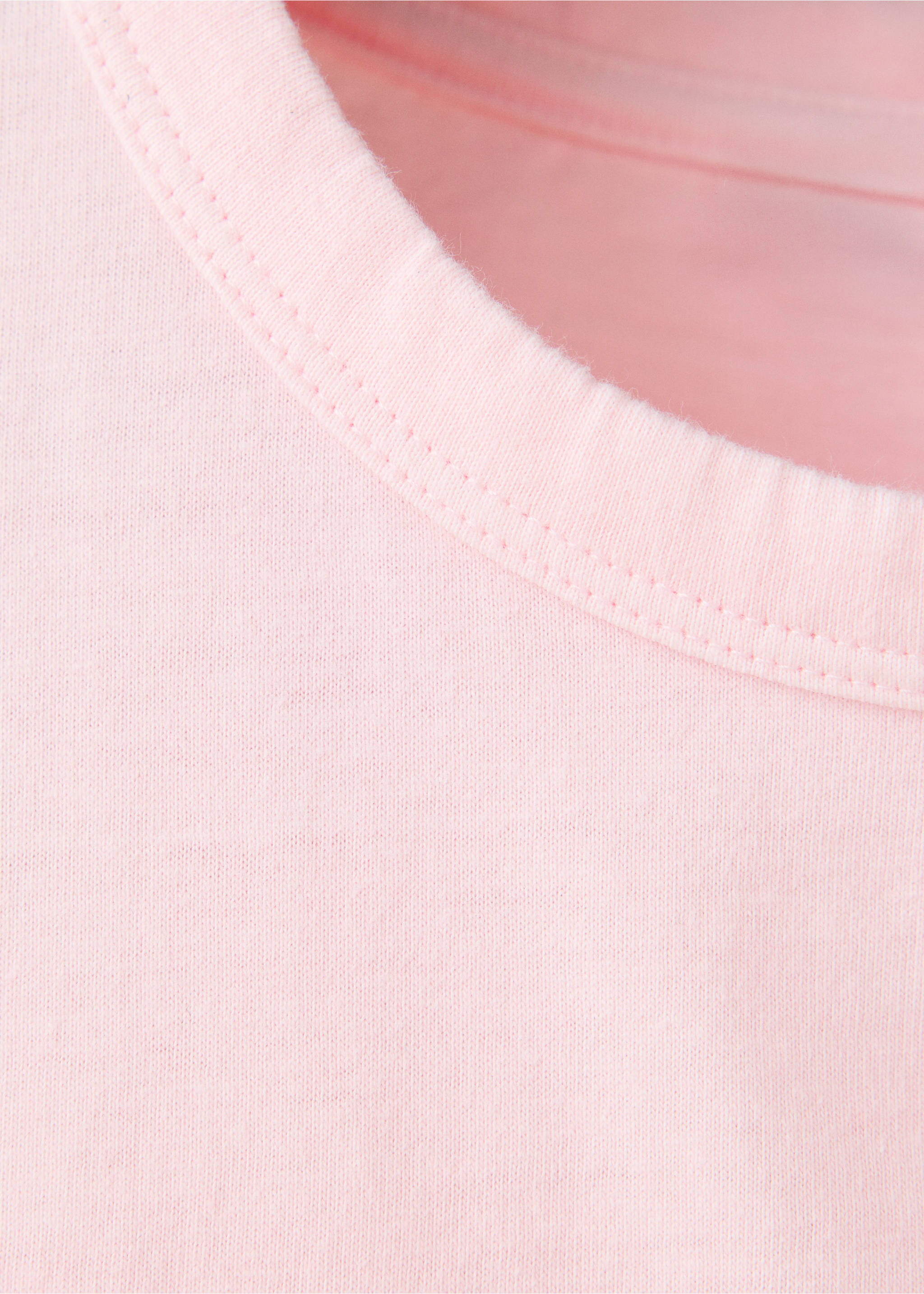 Close-up of a pale pink t-shirt showing the ribbed crew neckline., Pink. Ref: 37026743-00.