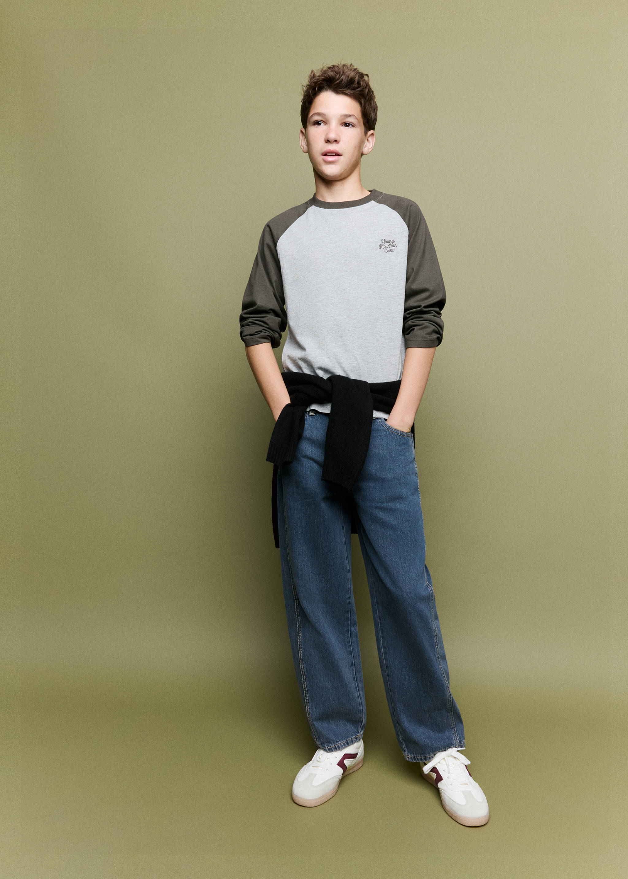 Grey and olive-green long-sleeved raglan t-shirt with text detail on the chest.