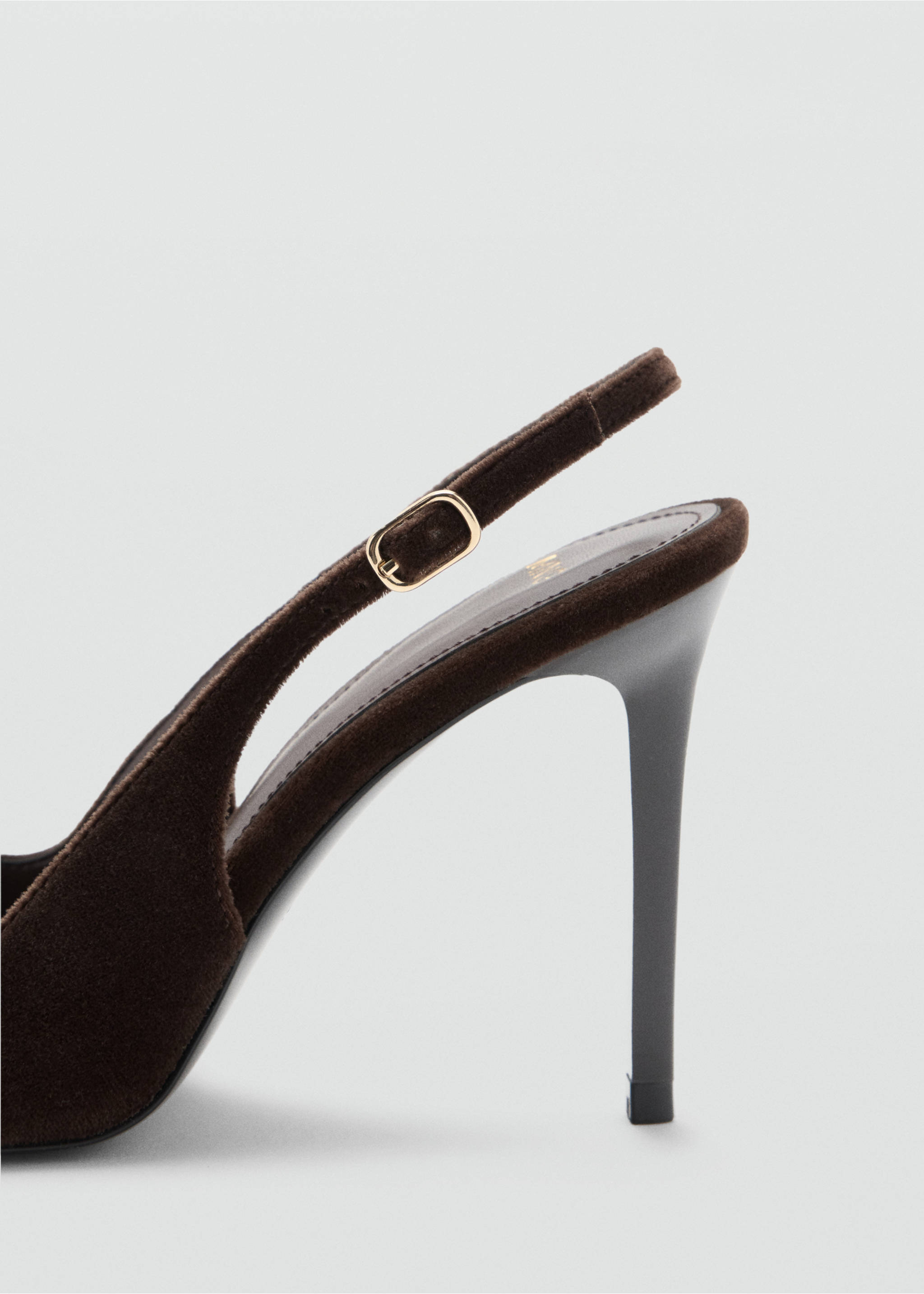 Close-up of a brown slingback shoe with a gold buckle and stiletto heel., Chocolate. Ref: 37027778-00.
