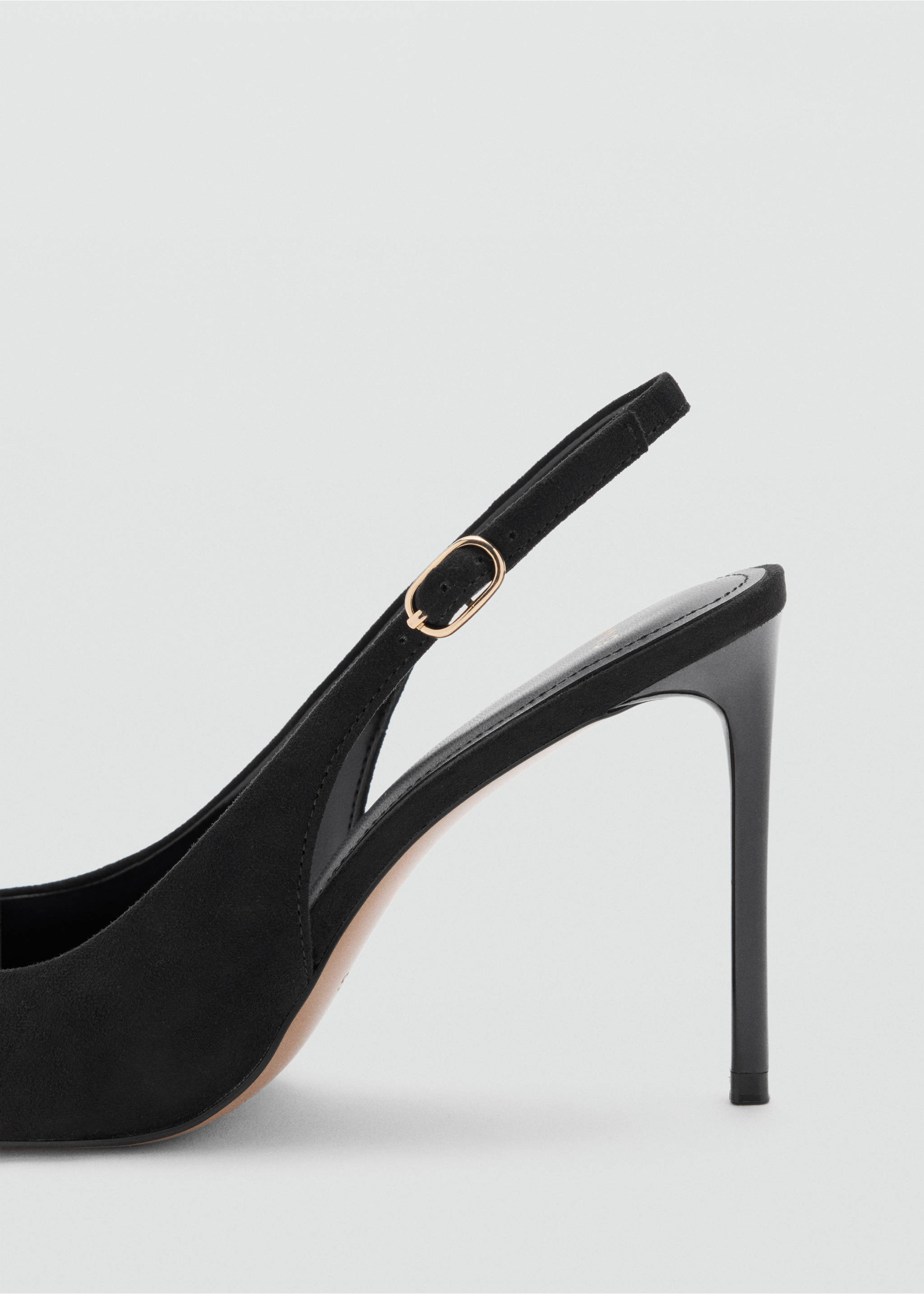 Close-up of a black slingback shoe with a stiletto heel and buckle detail., Black. Ref: 37027779-00.