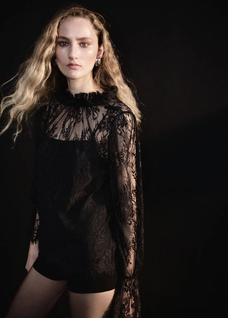 Semi-sheer lace blouse by Mango