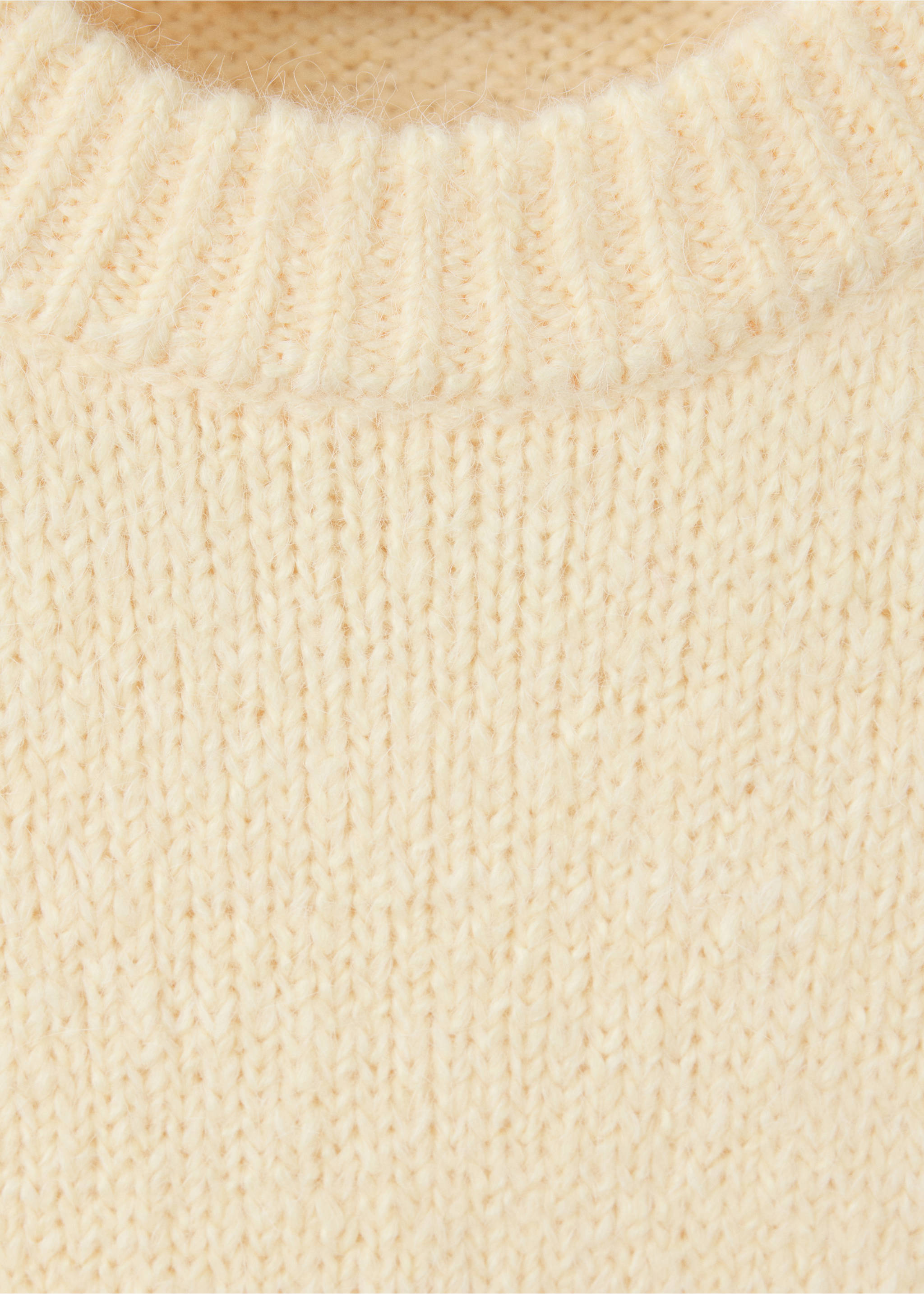 Cream sweater detail showing the ribbed neckline and knit texture., Pastel Yellow. Ref: 37027788-00.