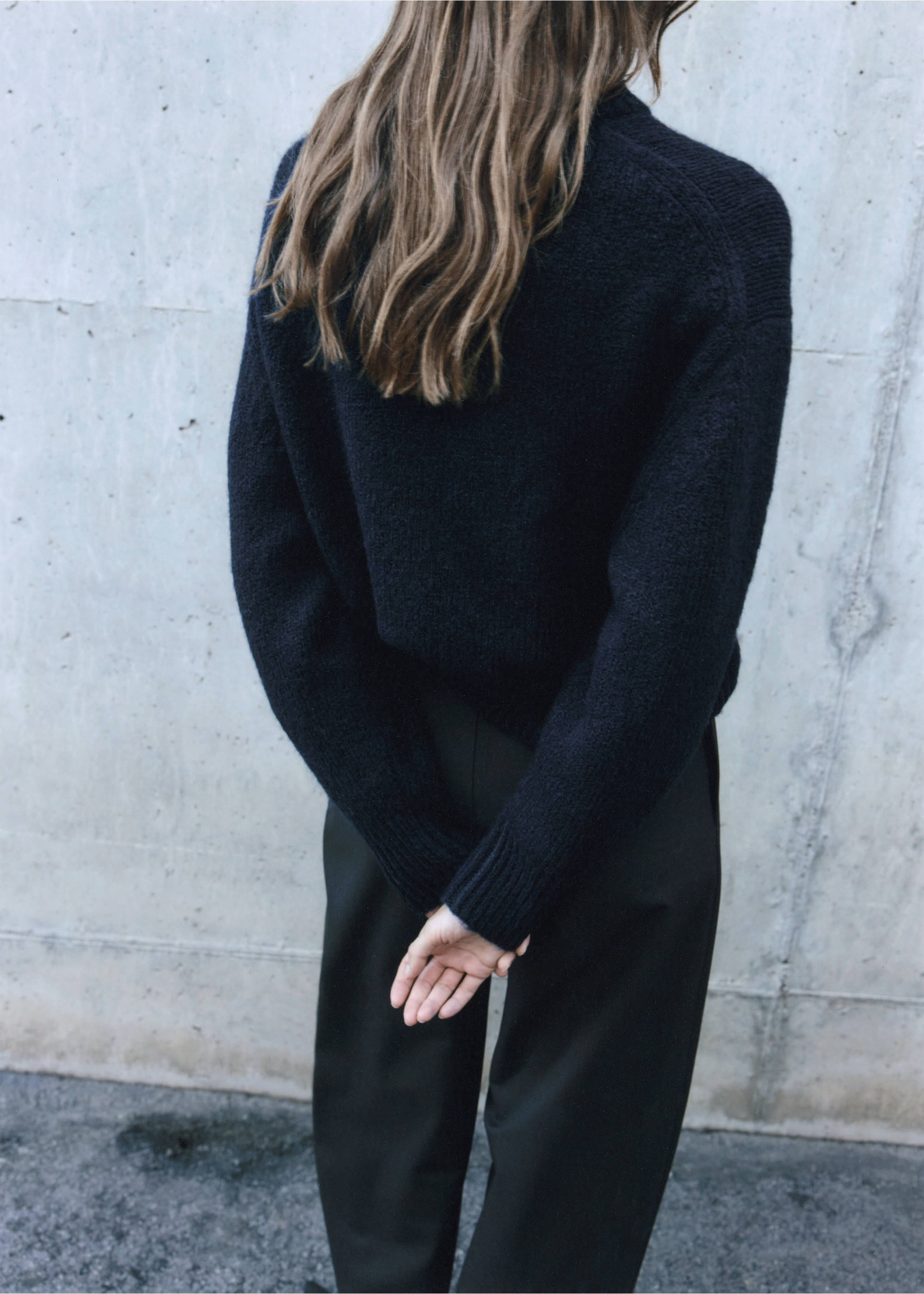 Dark navy blue knit sweater shown from the back with a ribbed trim., Navy. Ref: 37027788-00.