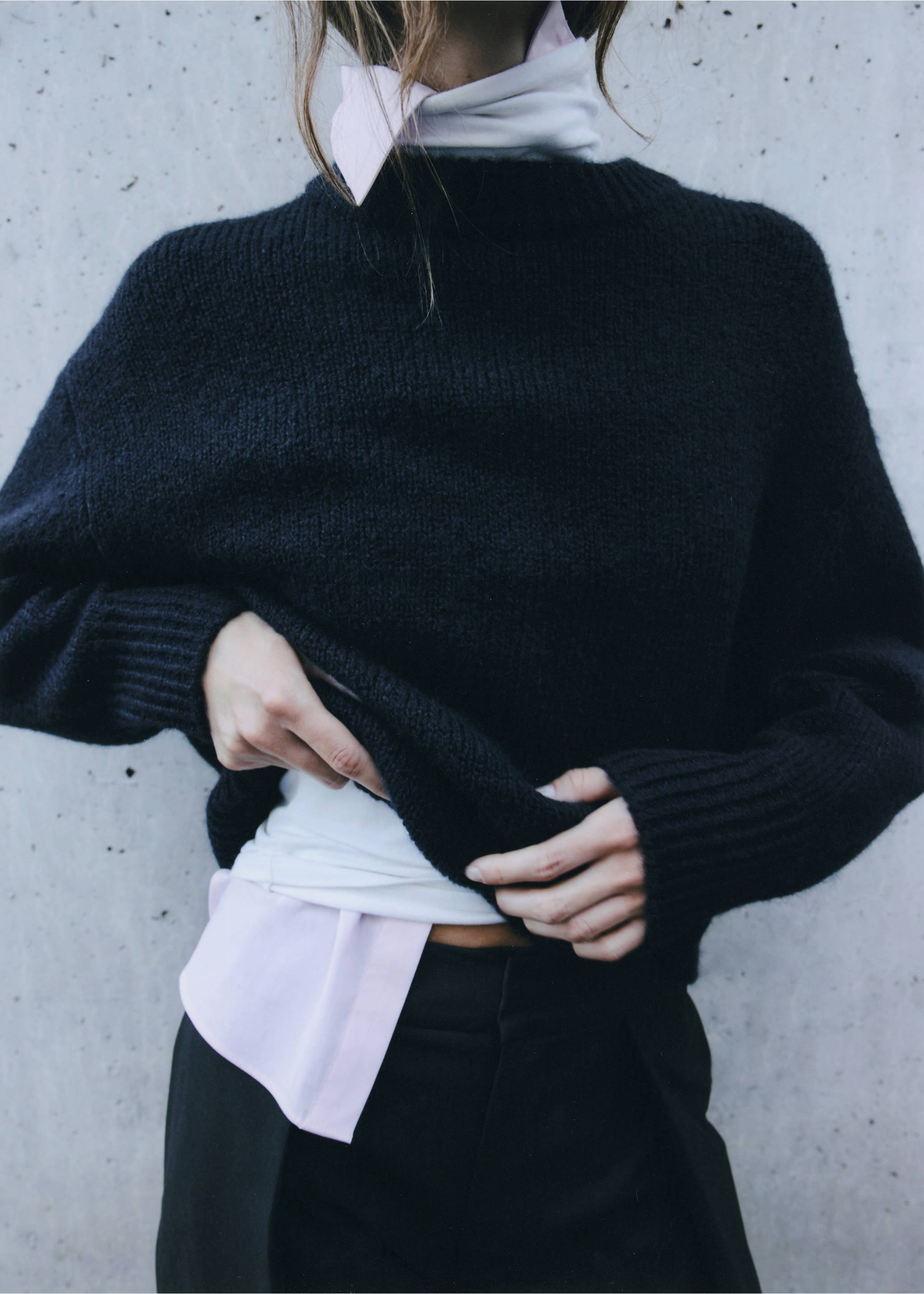 Black knit crew neck sweater layered over a collared shirt., Navy. Ref: 37027788-00.