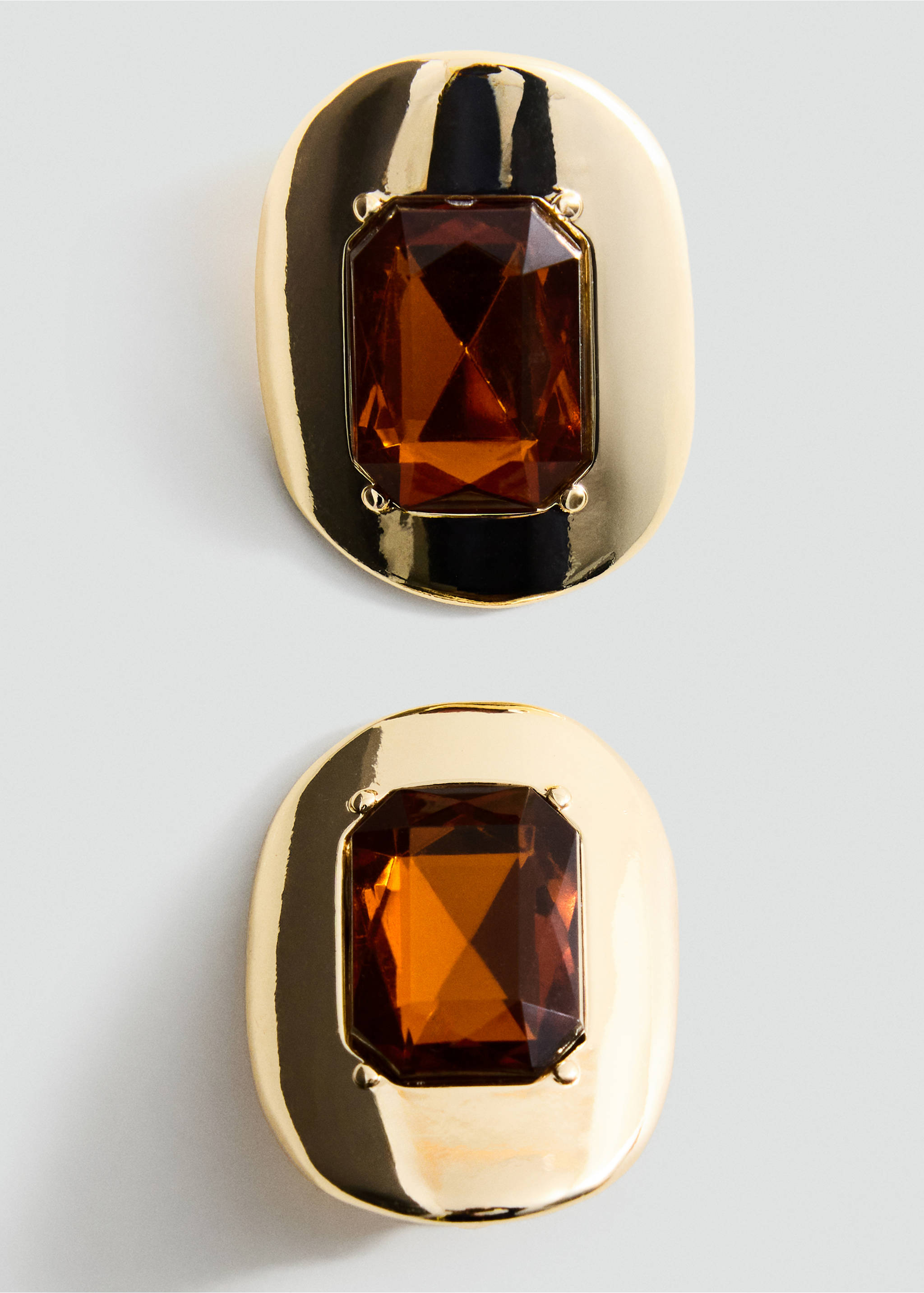 Gold-plated earrings featuring a polished oval base and a large rectangular faceted amber stone., Gold. Ref: 37027799-00.