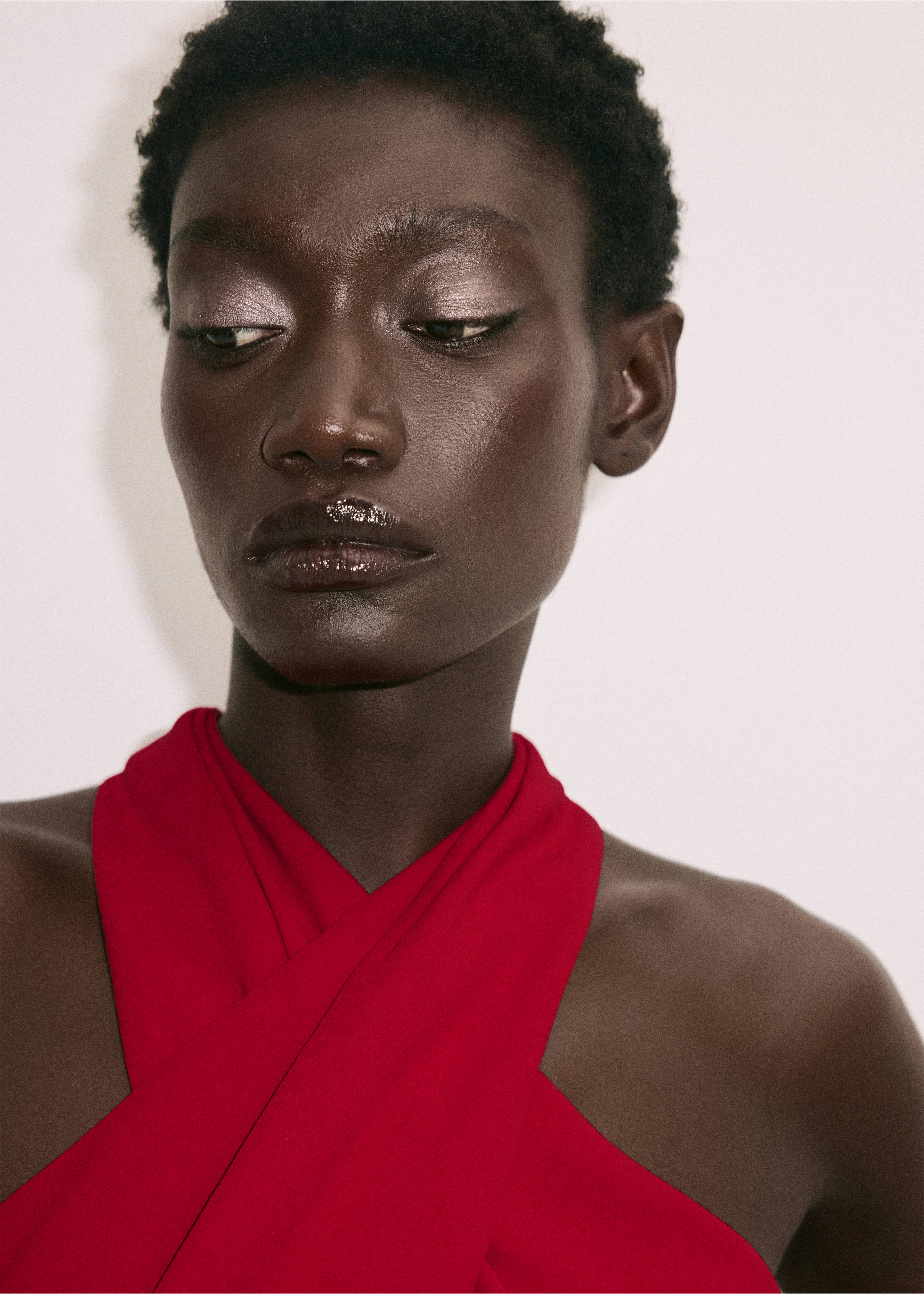 Red halter neck jumpsuit in a close-up model view., Red. Ref: 37027808-00.