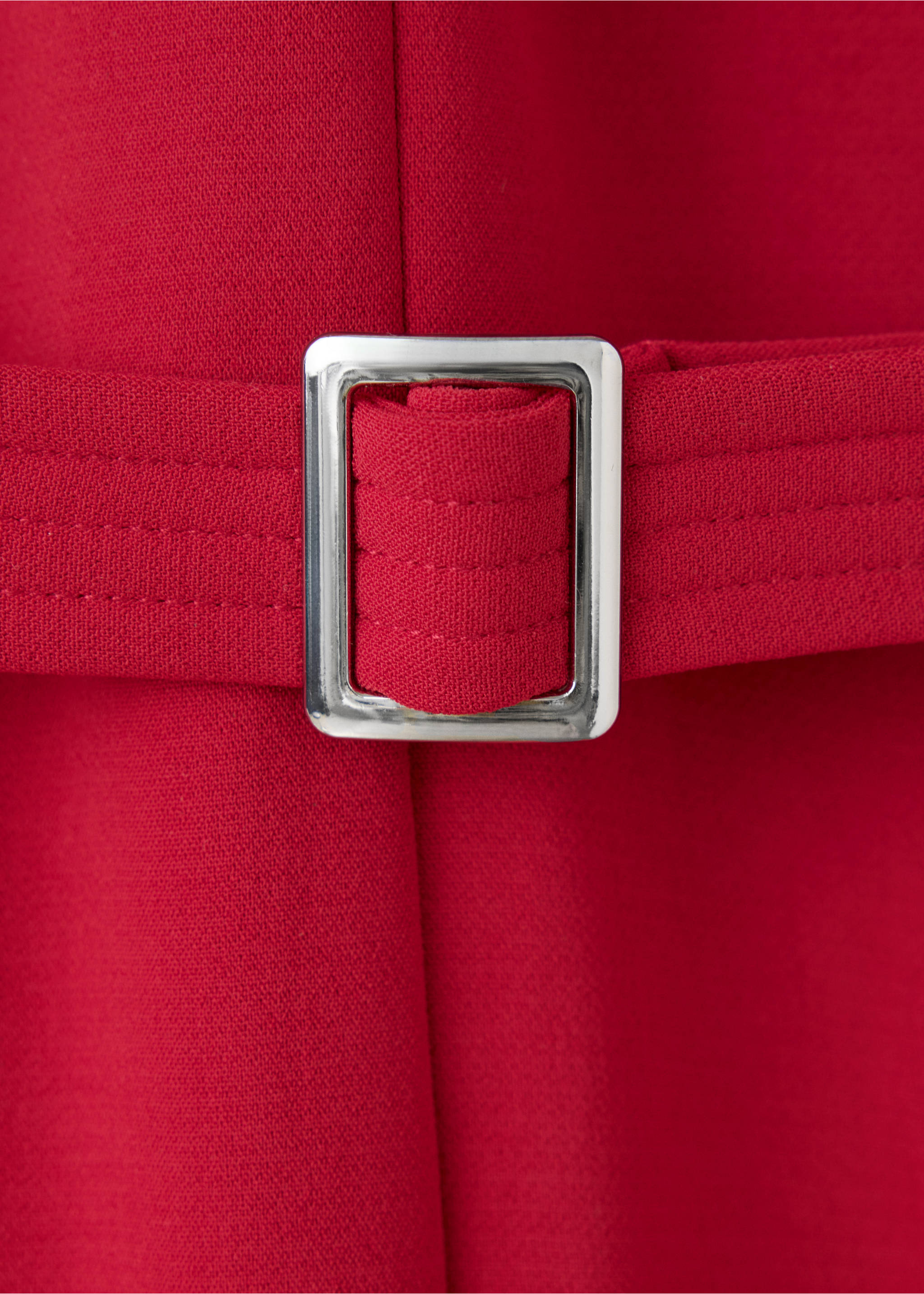 Close-up of a red jumpsuit belt with silver buckle., Red. Ref: 37027808-00.