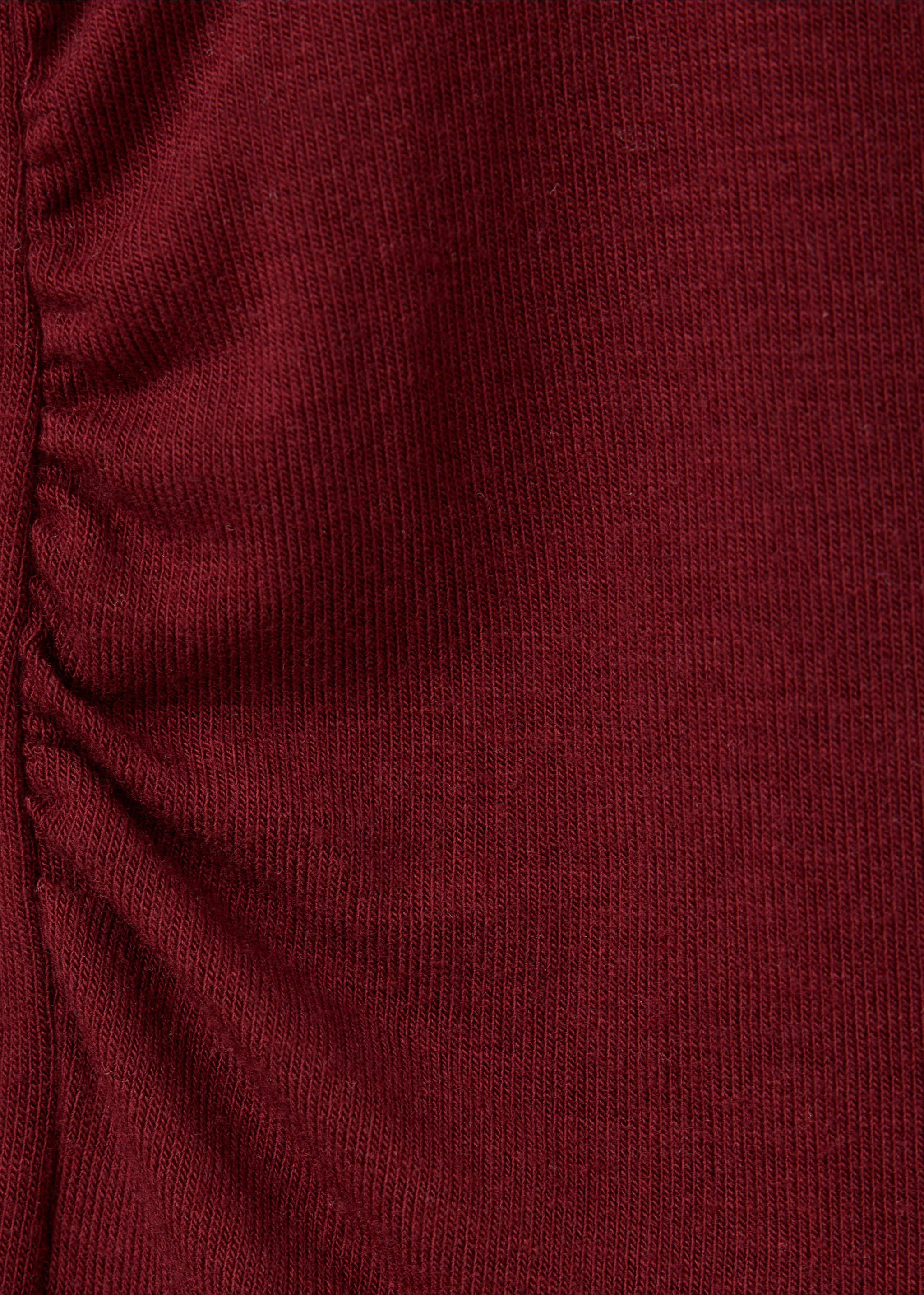 Close-up of a dark red t-shirt with ruched side detail., Burgundy. Ref: 37027815-00.
