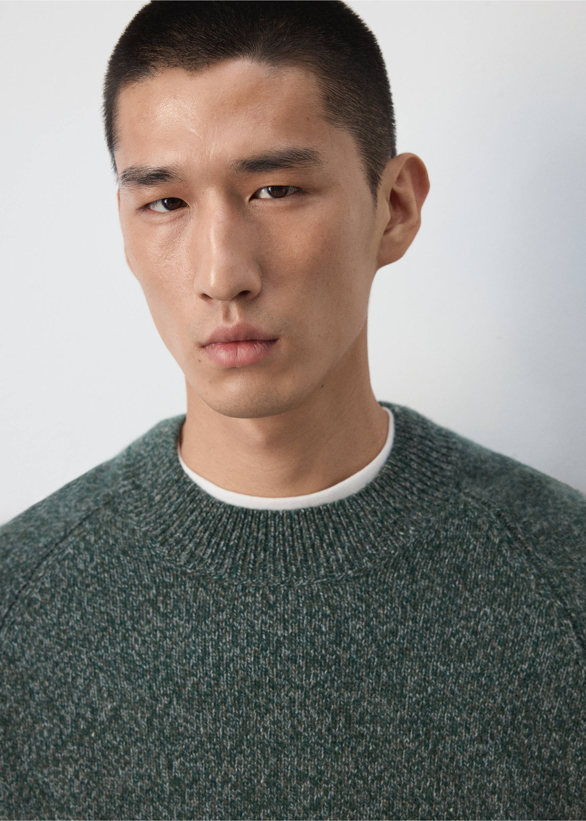 Close-up of a dark green ribbed crew neck jersey., Dark Green. Ref: 37027887-00.