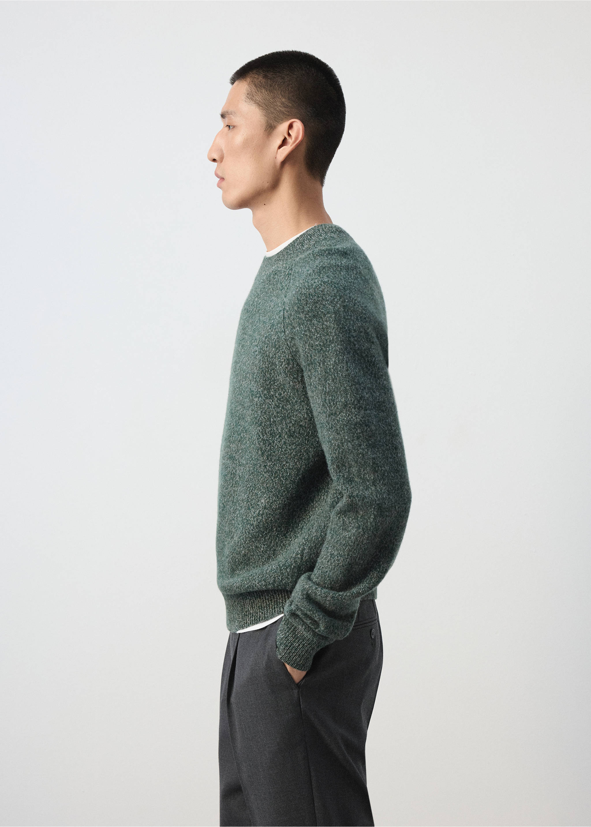 Dark green speckled crew neck jersey with ribbed trims worn over a white t-shirt., Dark Green. Ref: 37027887-00.