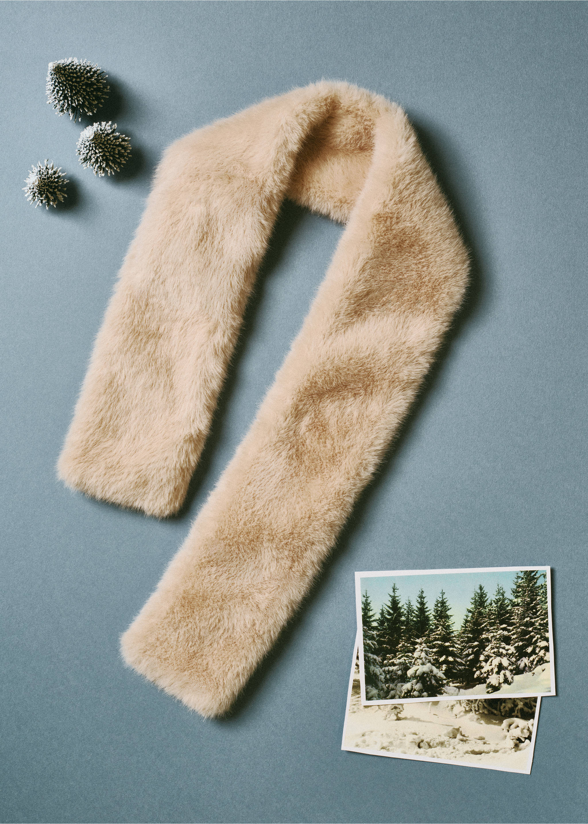 Beige faux-fur scarf in a creative still-life setting., Sand. Ref: 37027898-00.