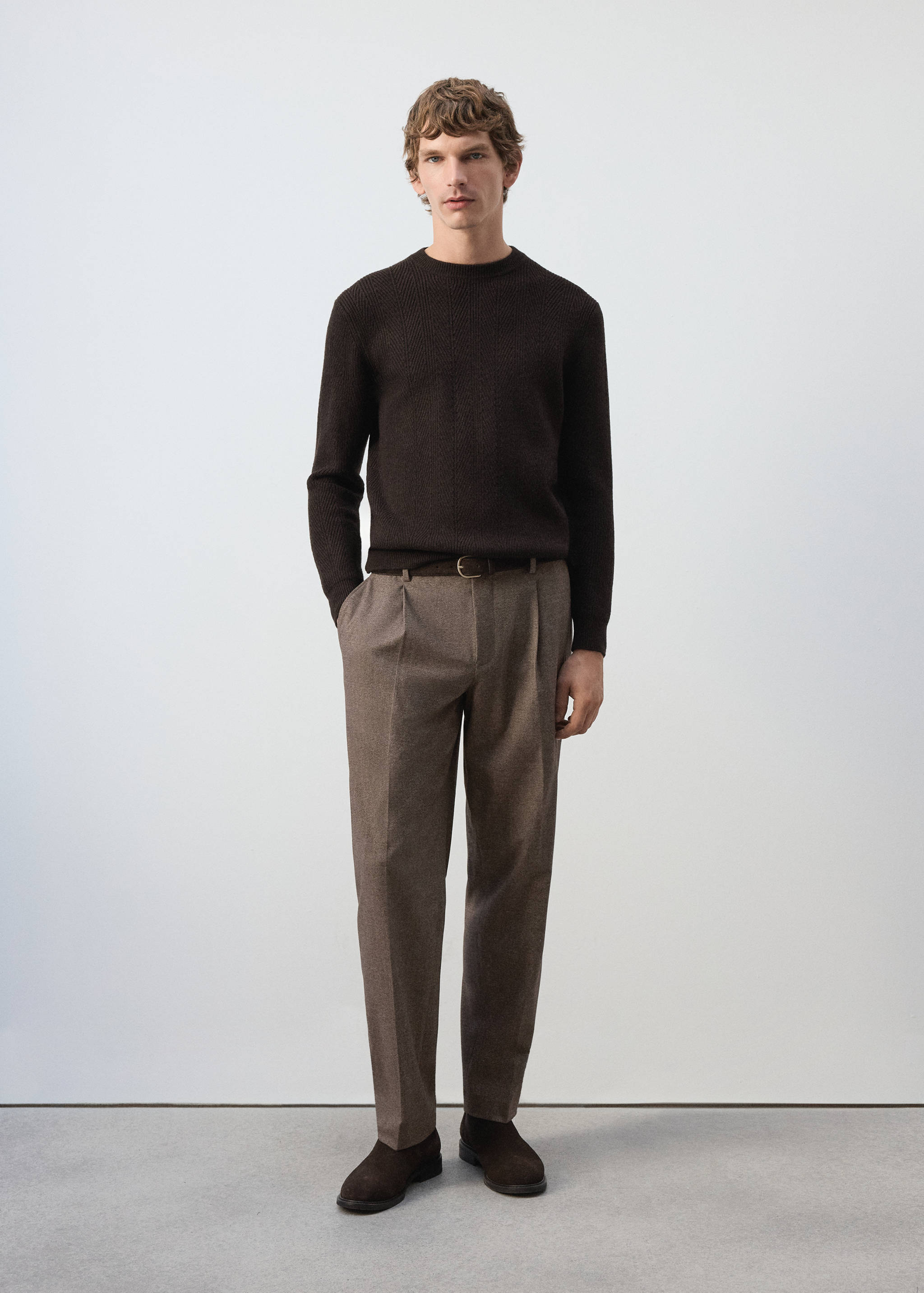 Dark brown crew neck jersey with long sleeves and ribbed trim.