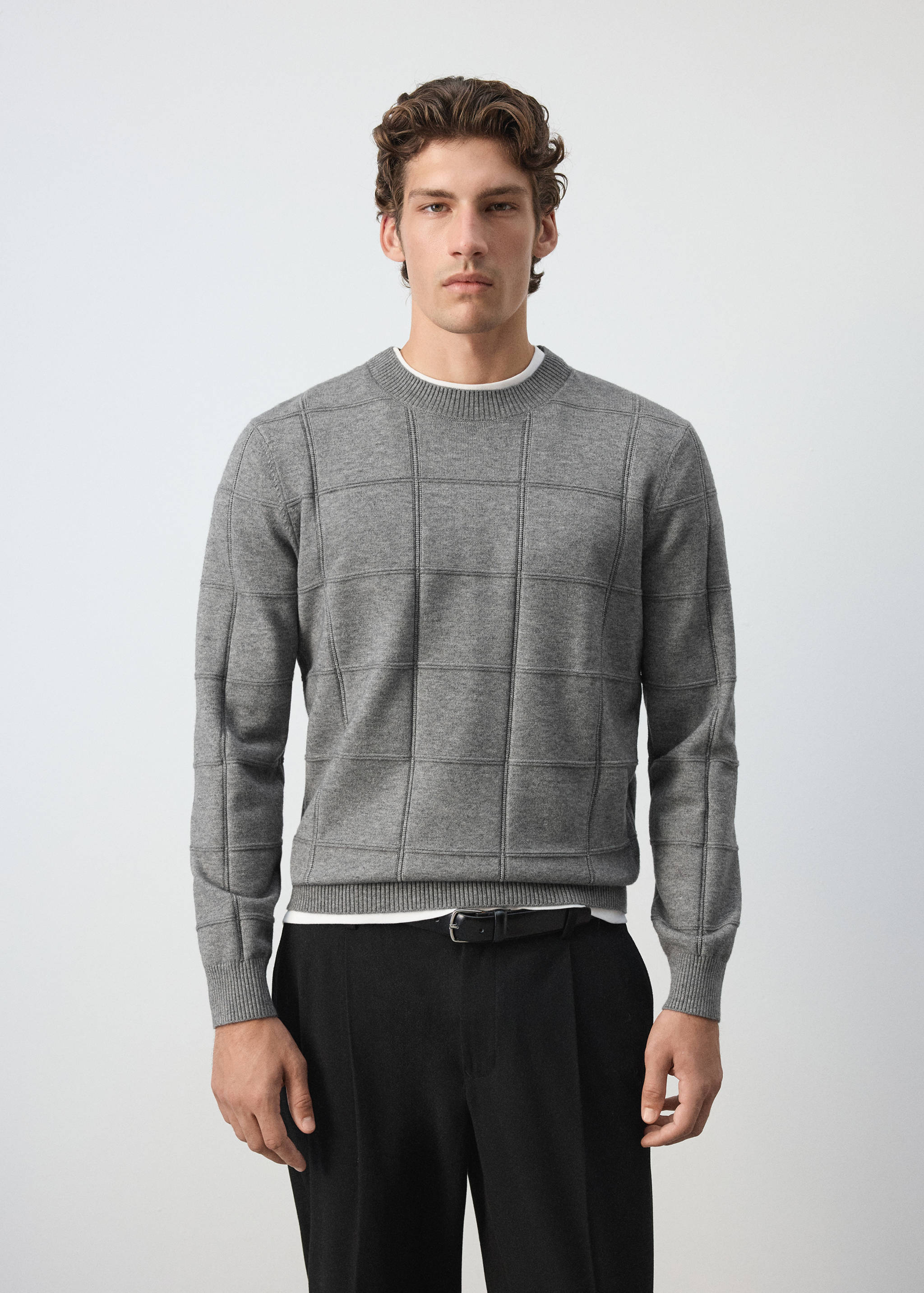 Grey grid-pattern knit sweater with a crew neck and ribbed trims.