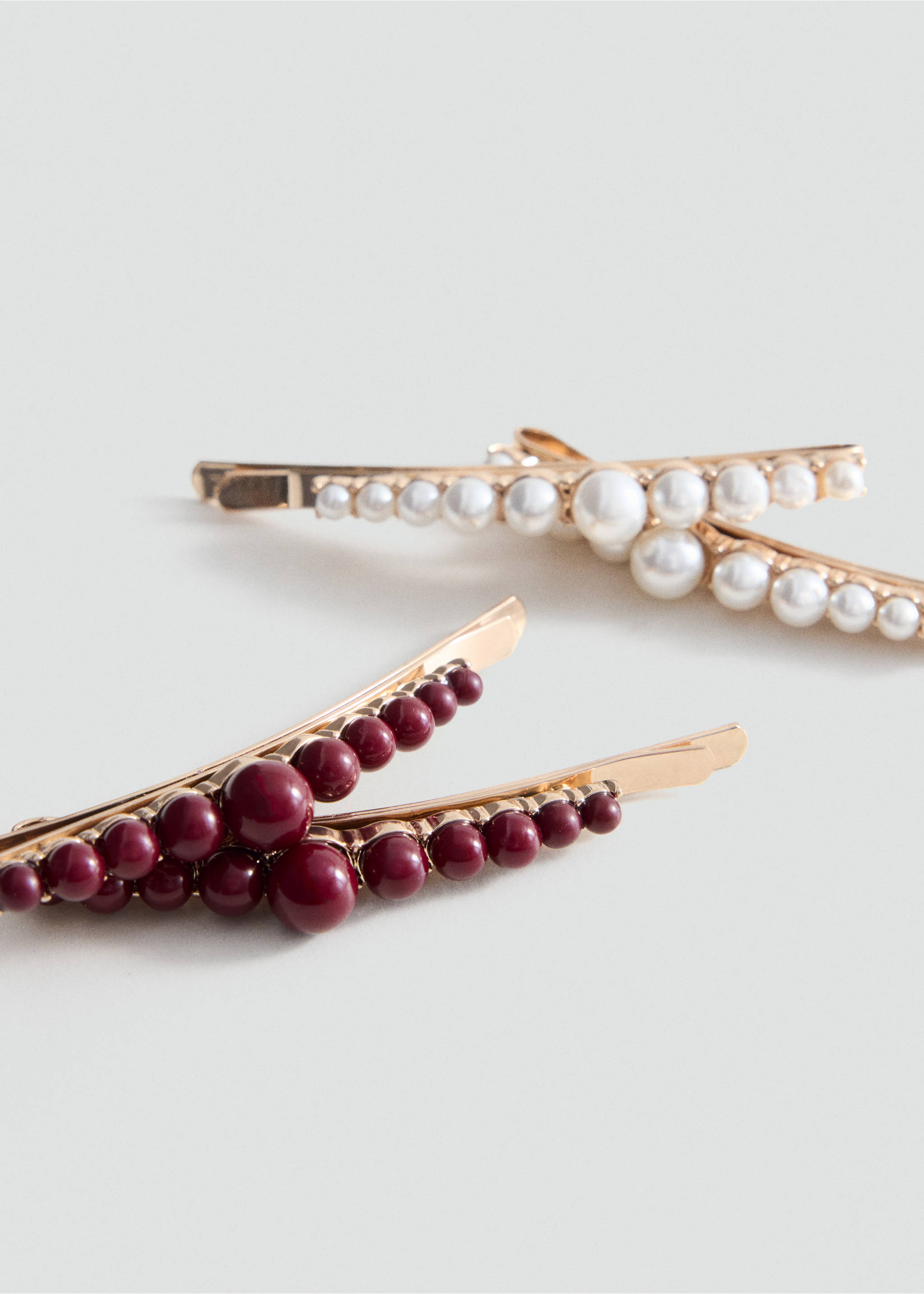 Lot de 4 barrettes avec perles - Plan moyen, Or. Ref: 37027916-00.