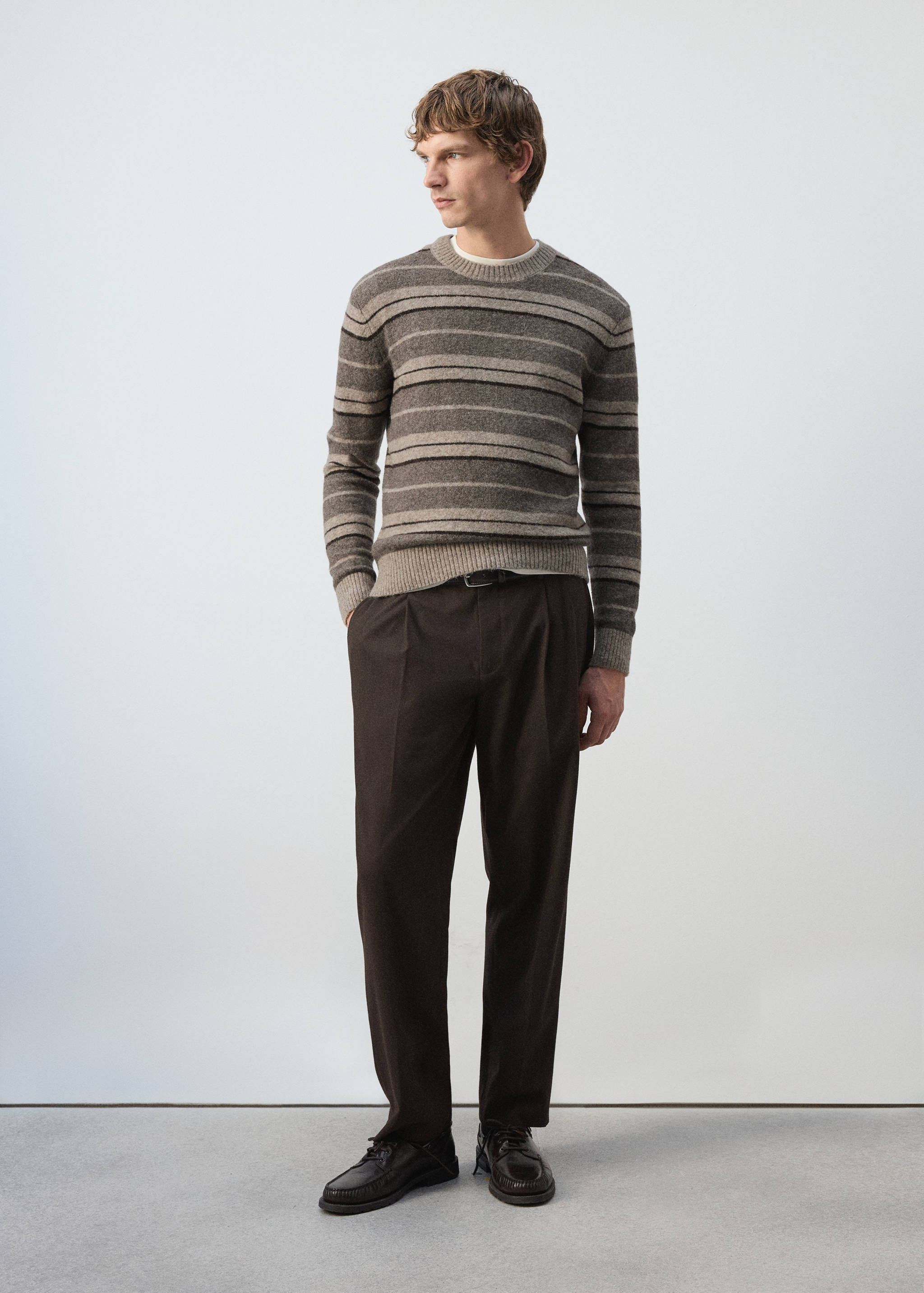 Brown striped knitted crew-neck sweater with ribbed trim.