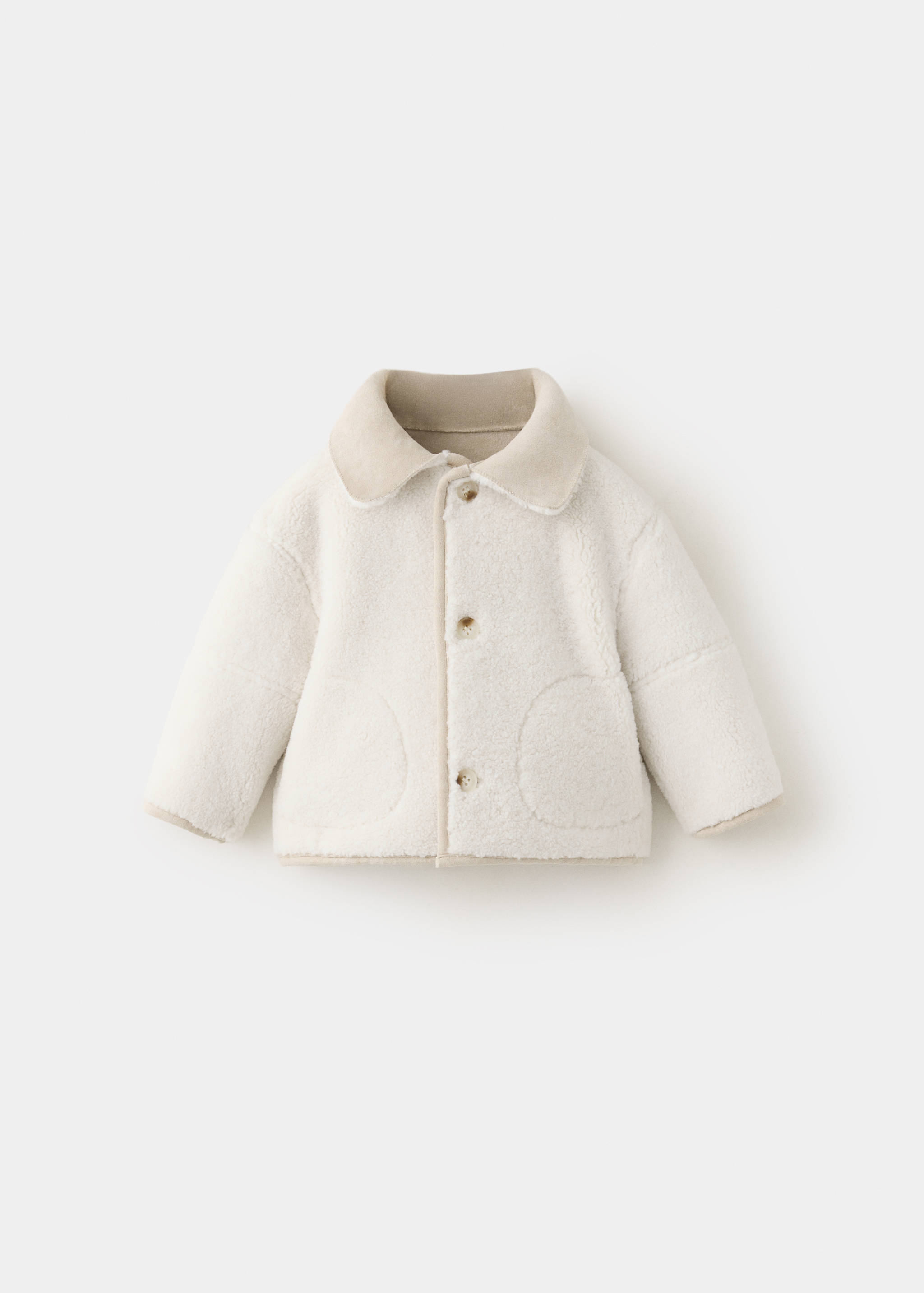 Off-white children's coat in soft textured faux-shearling with a smooth collar.