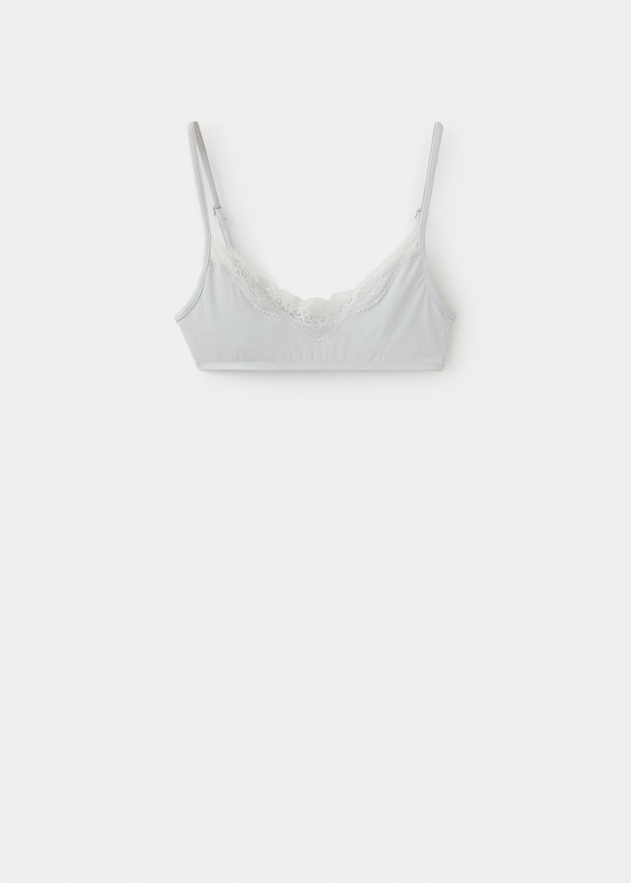 Pale blue bralette with white lace trim and adjustable straps.