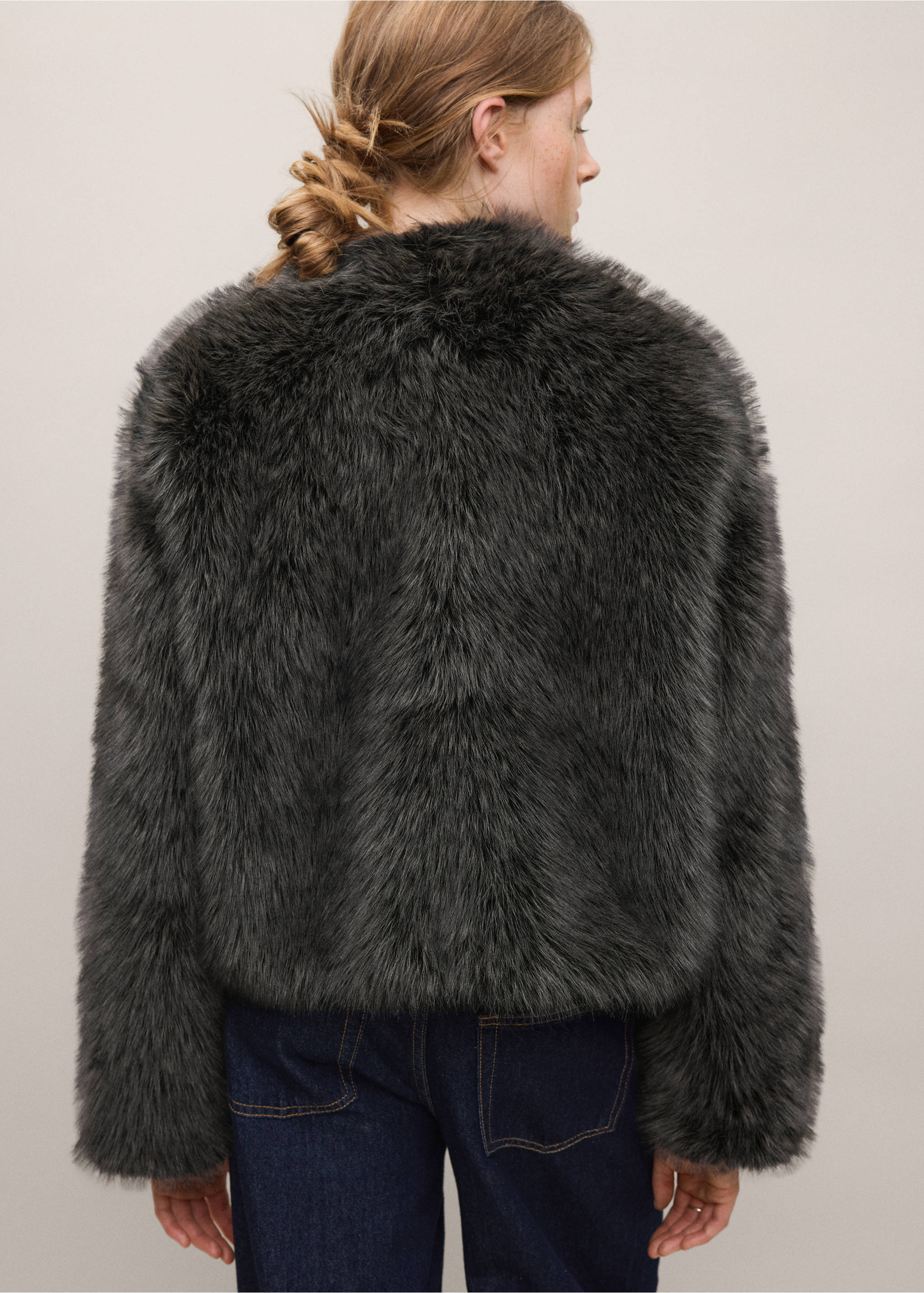 Dark grey faux-fur coat from the back, featuring a round neckline and long sleeves., Black. Ref: 37028265-00.