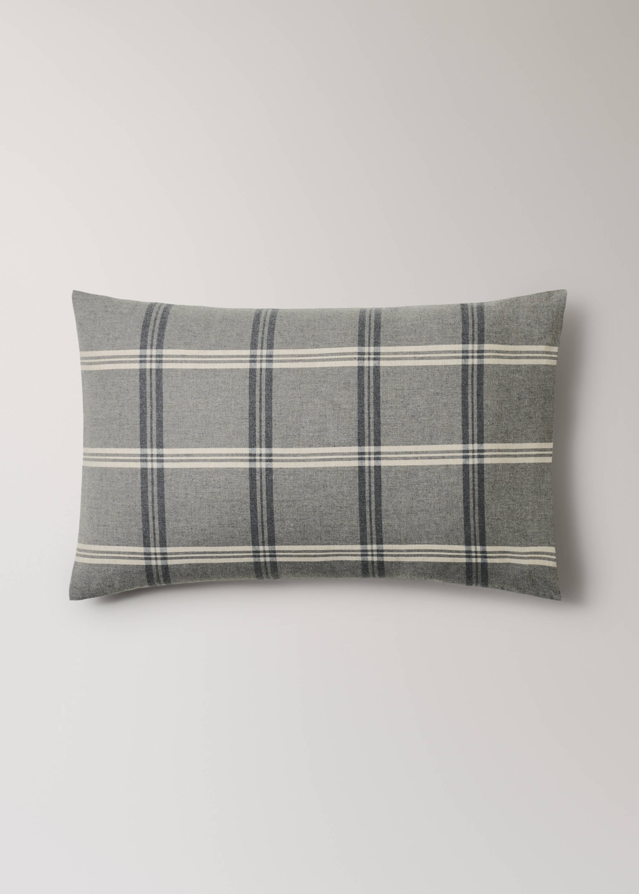 Grey plaid pillowcase with intersecting white and navy lines.