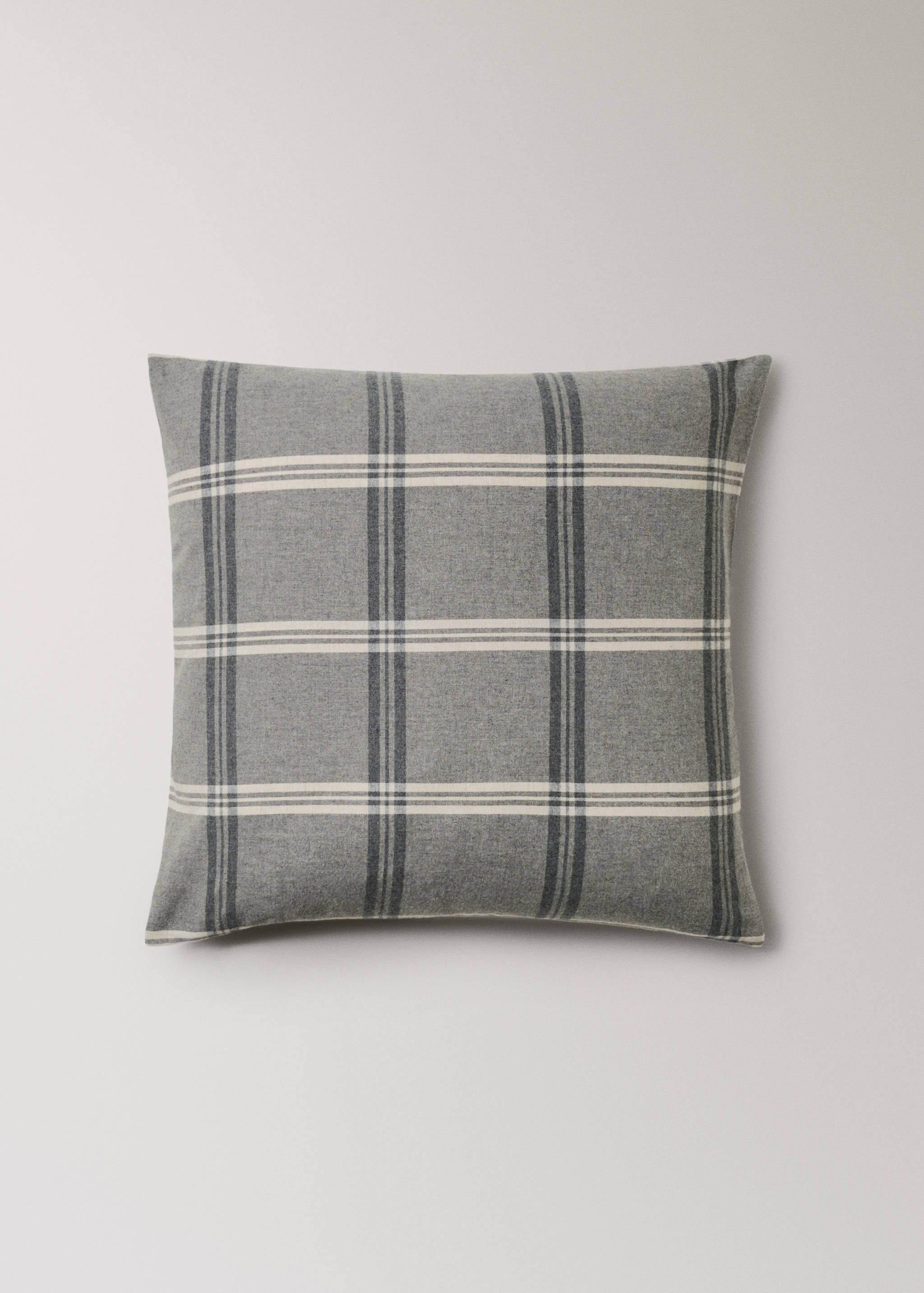 Grey plaid pillowcase with white and dark grey stripes.