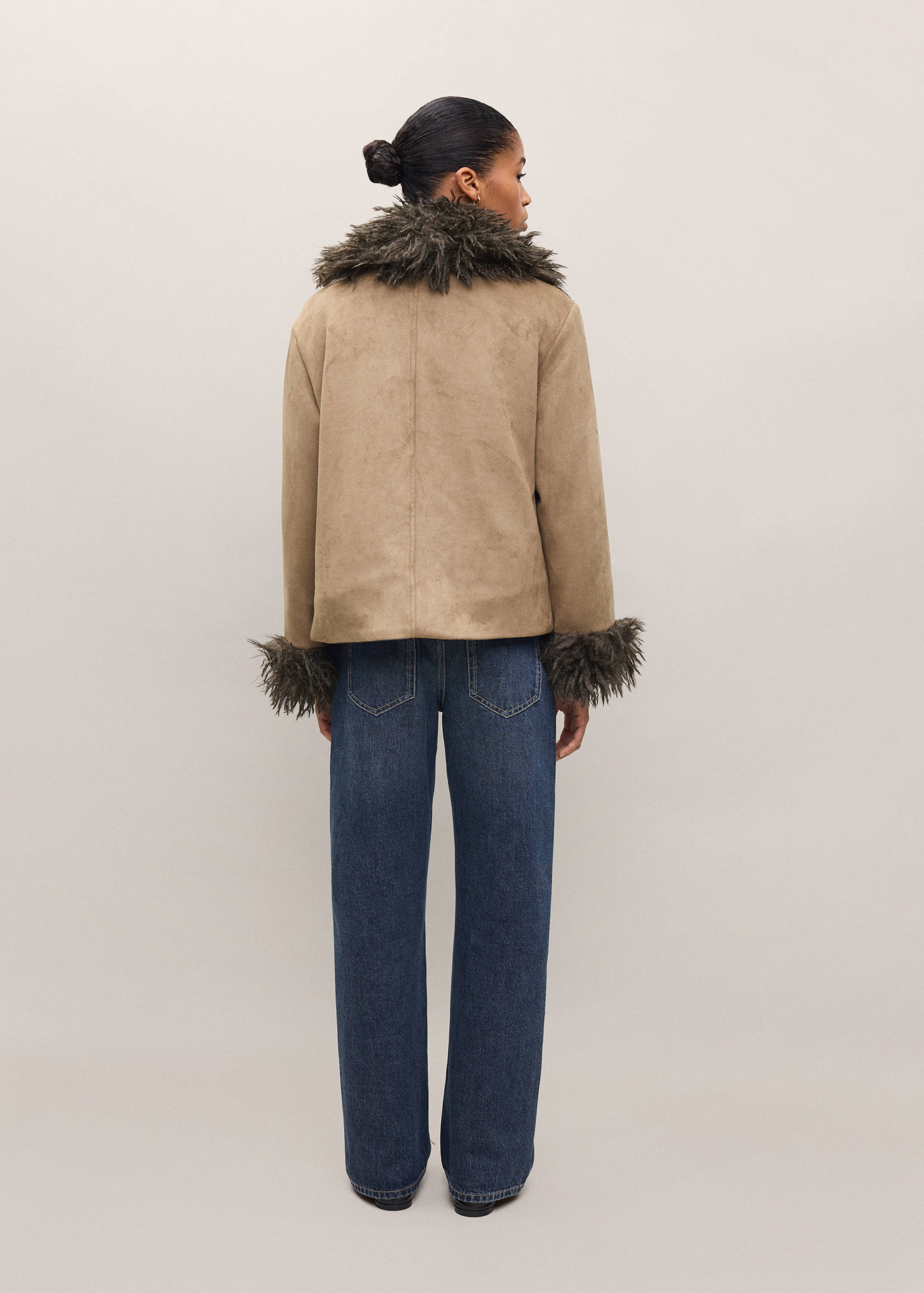 Camel faux-suede coat with dark faux-fur collar and cuffs, back view.