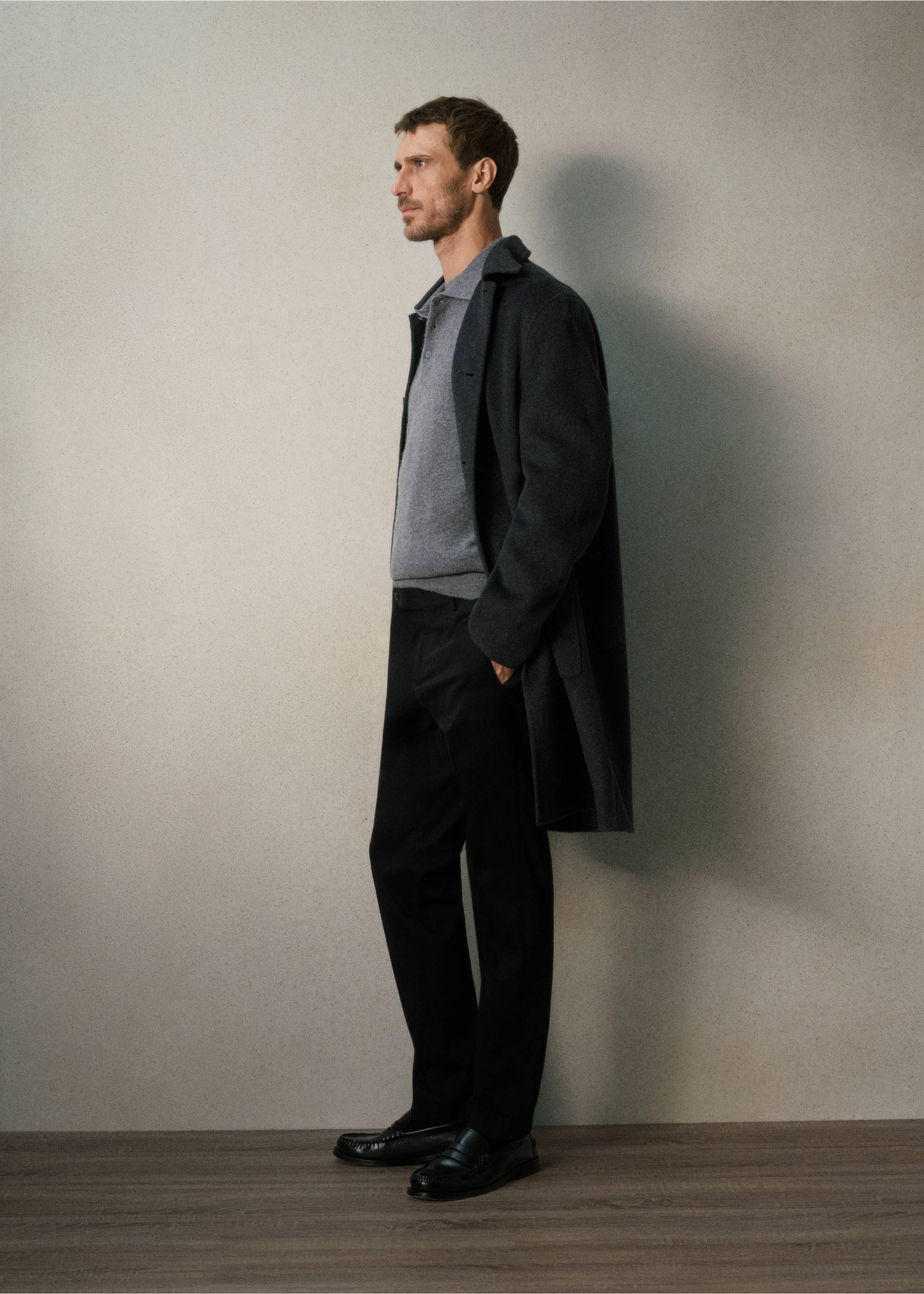 Black trousers worn with a dark grey coat and grey polo shirt., Black. Ref: 37028631-00.