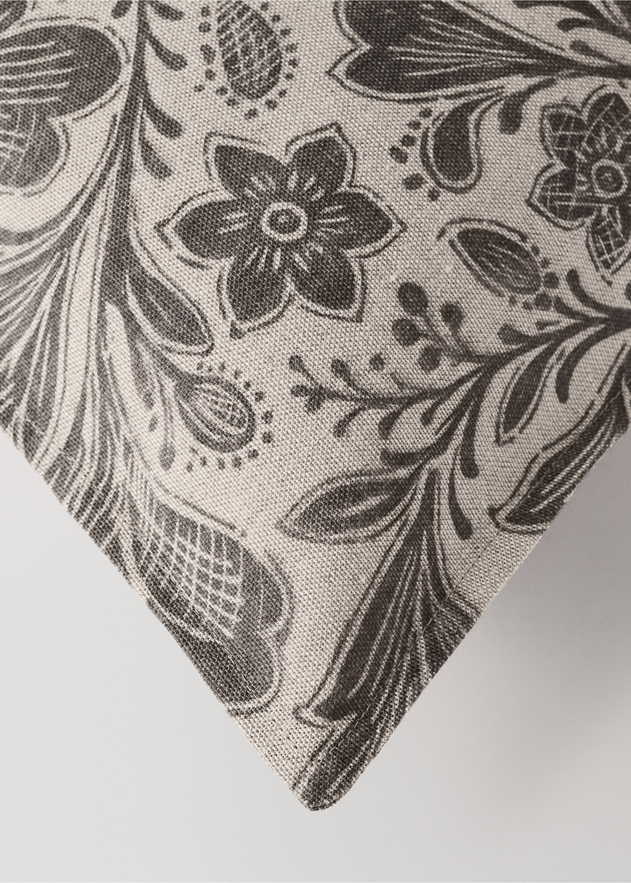 Close-up of a cushion cover with a dark grey floral print., Grey. Ref: 37028638-00.