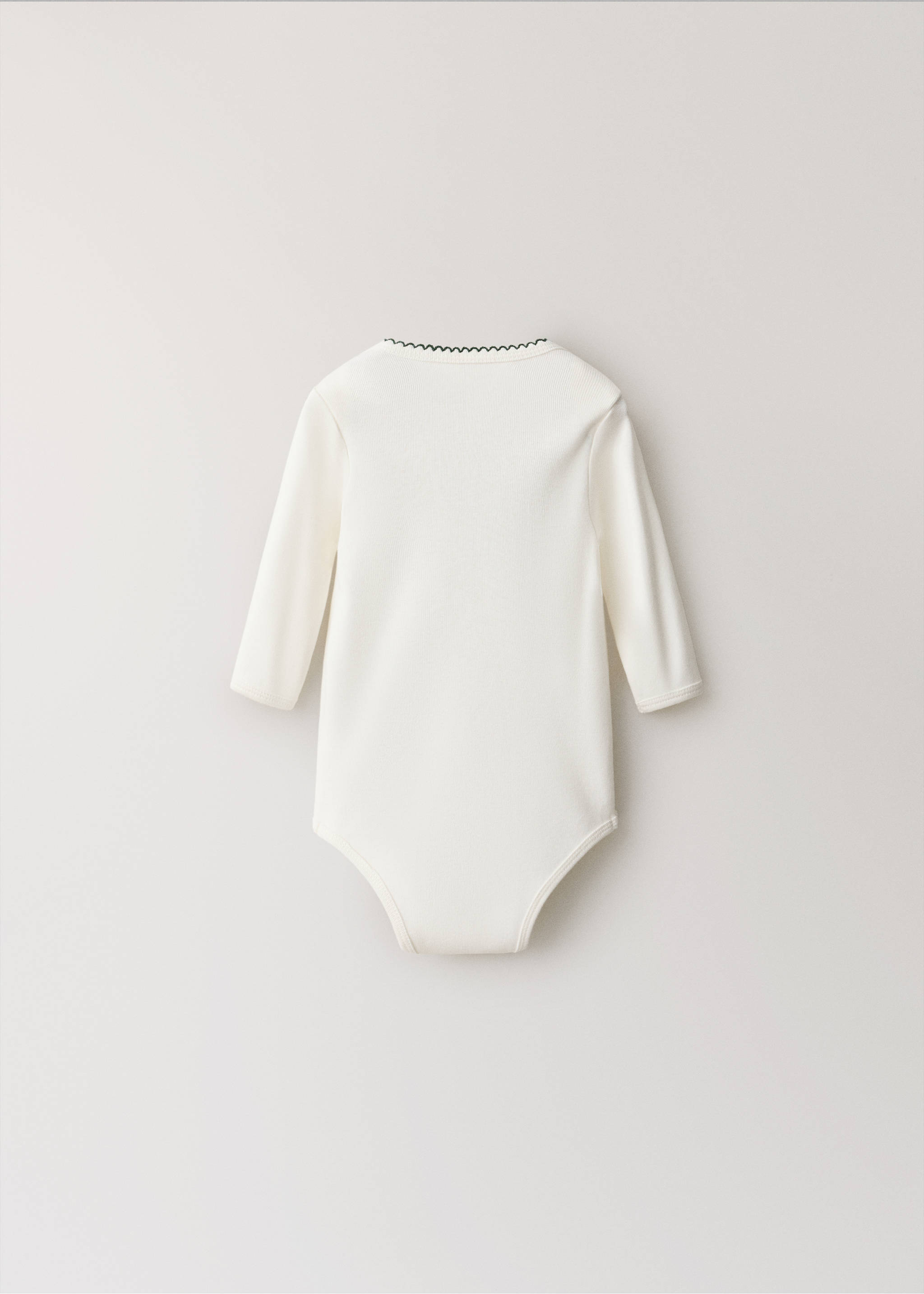 Off-white long-sleeved baby body with dark scalloped neckline trim, back view., Ivory White. Ref: 37028641-00.