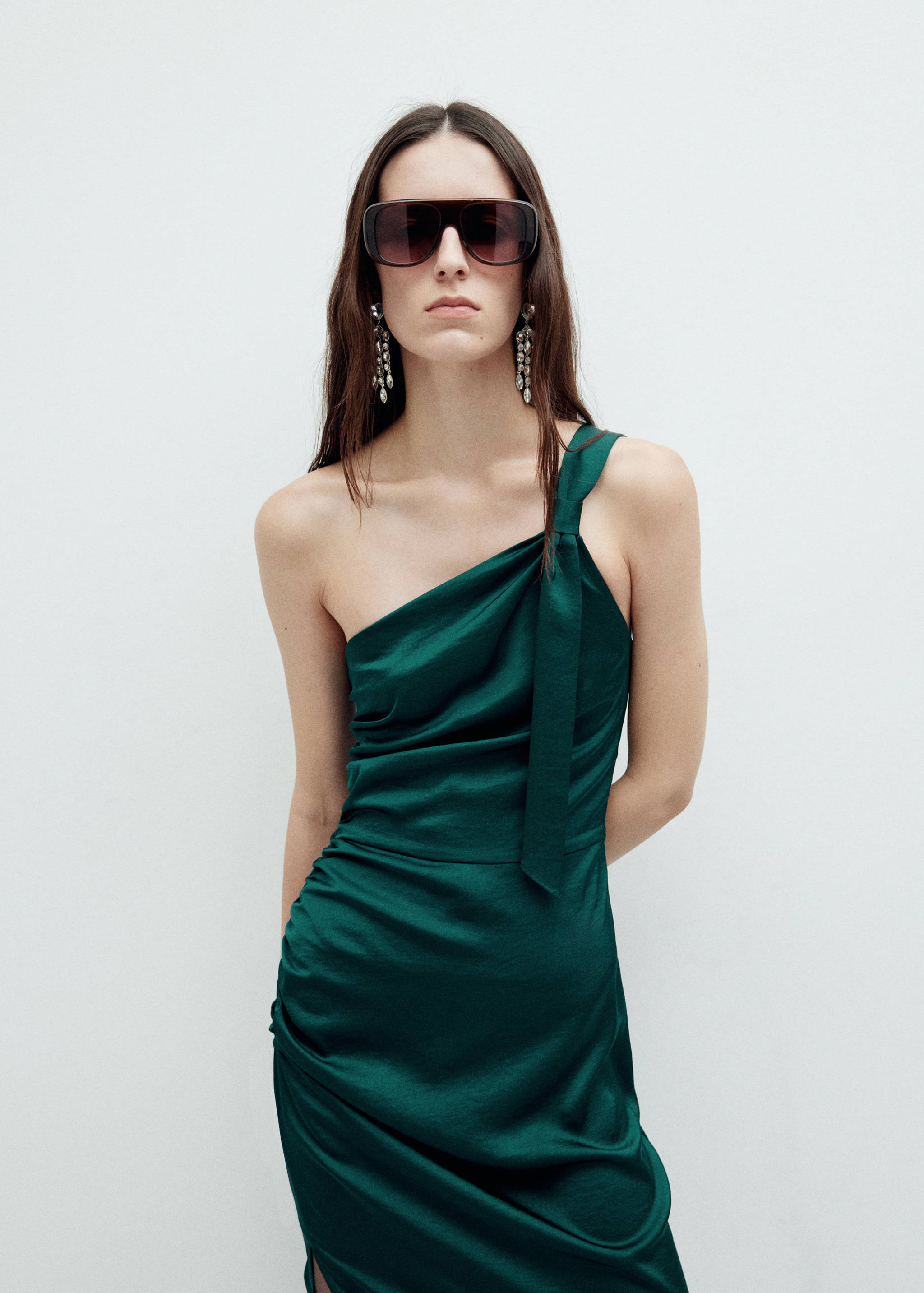 Dark green one-shoulder dress with a strap tie and side gathering.
