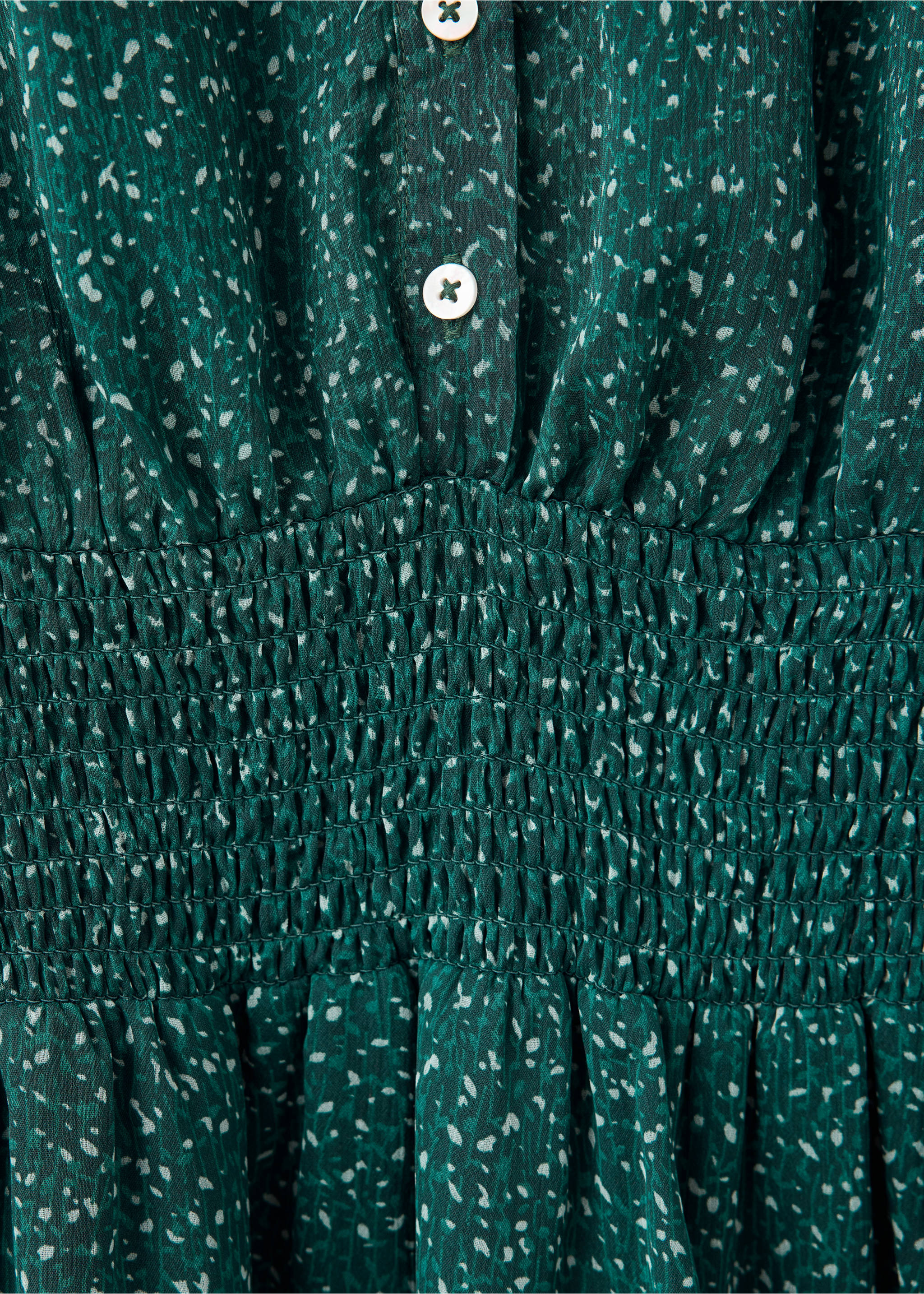 Green speckled dress fabric detail with a smocked waist and buttons, Petrol Blue. Ref: 37029121-00.