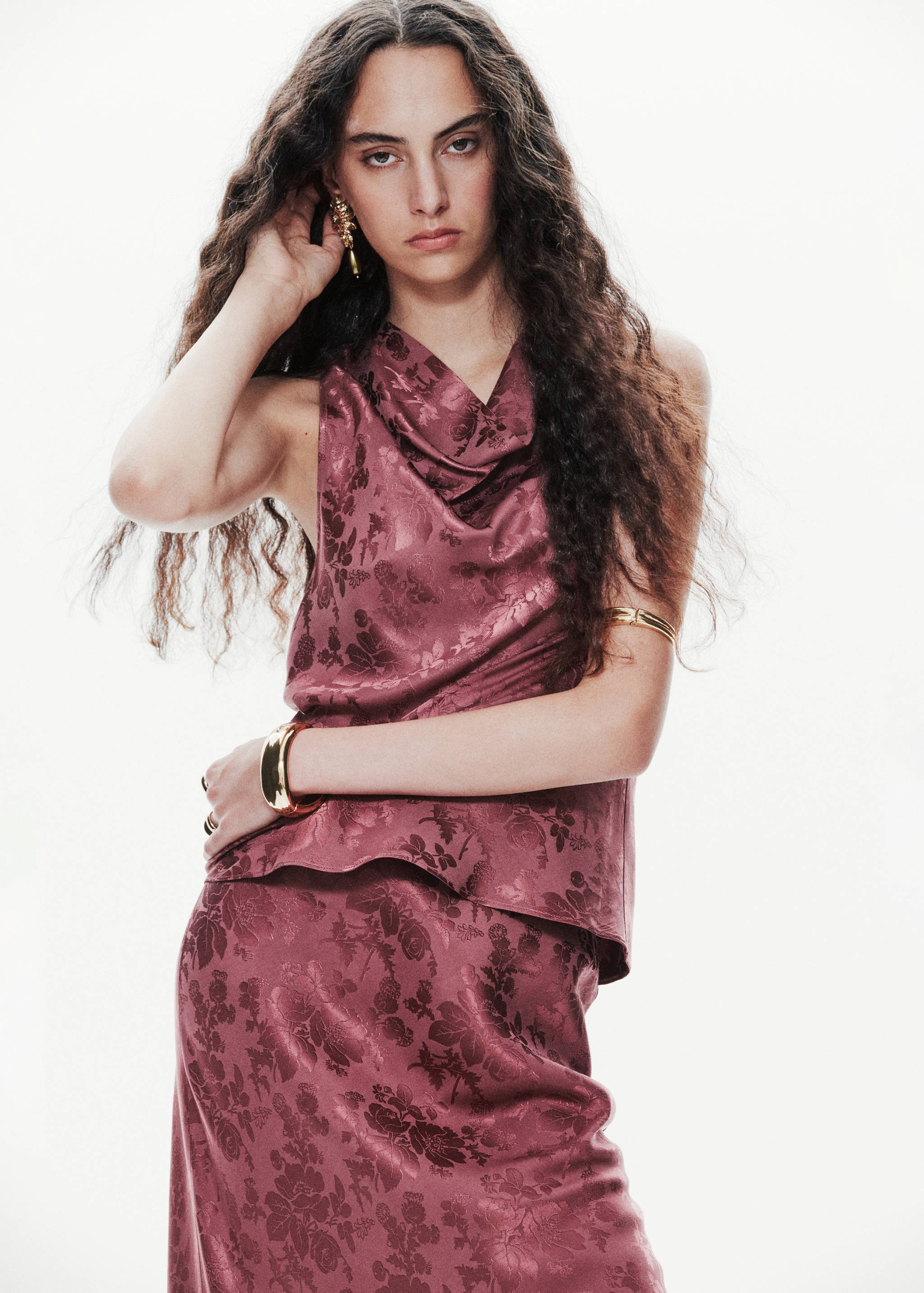 Mauve floral jacquard sleeveless blouse with a draped cowl neckline.