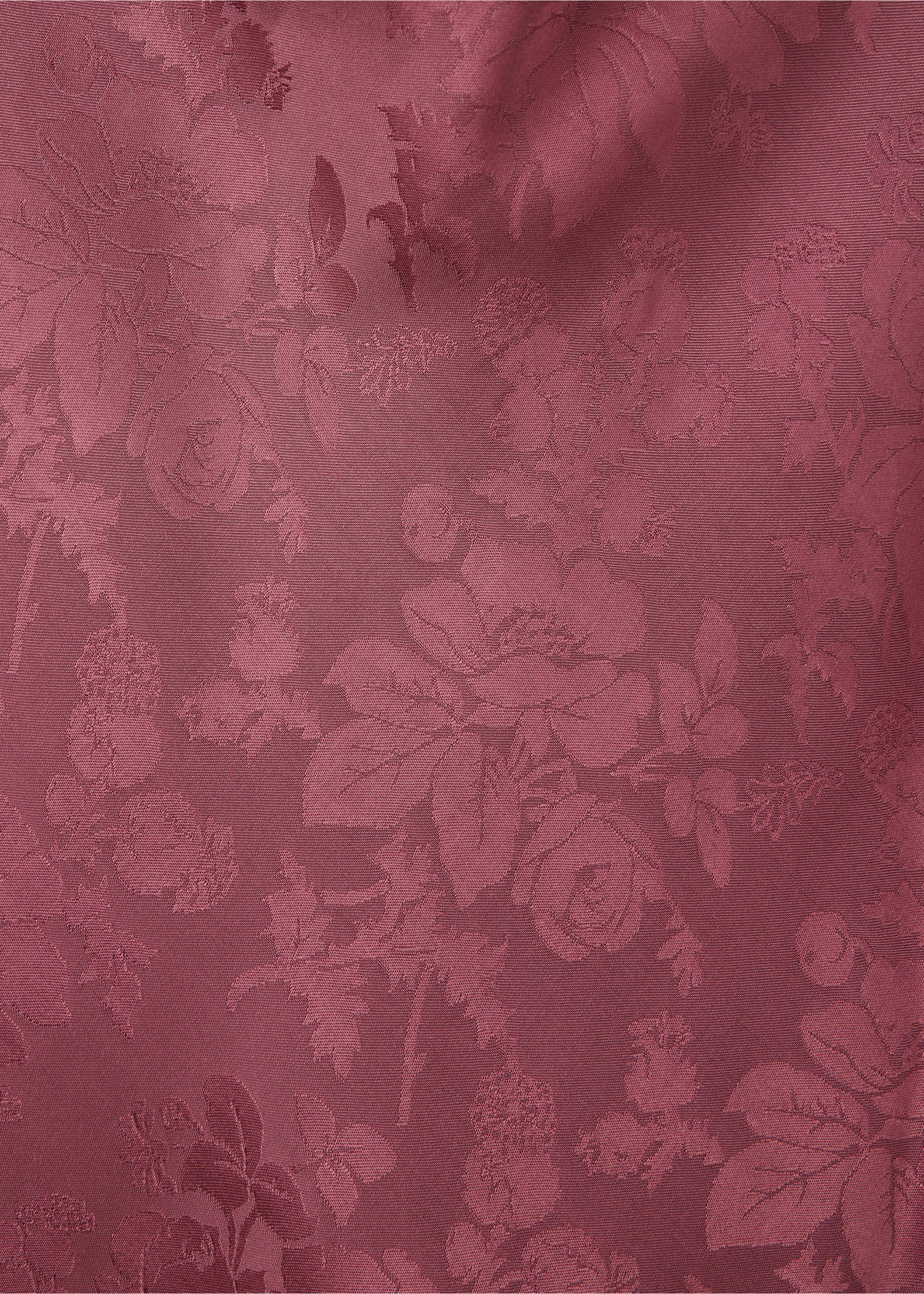Close-up of the plum-coloured blouse fabric showing a tonal floral jacquard pattern., Pink. Ref: 37029122-00.