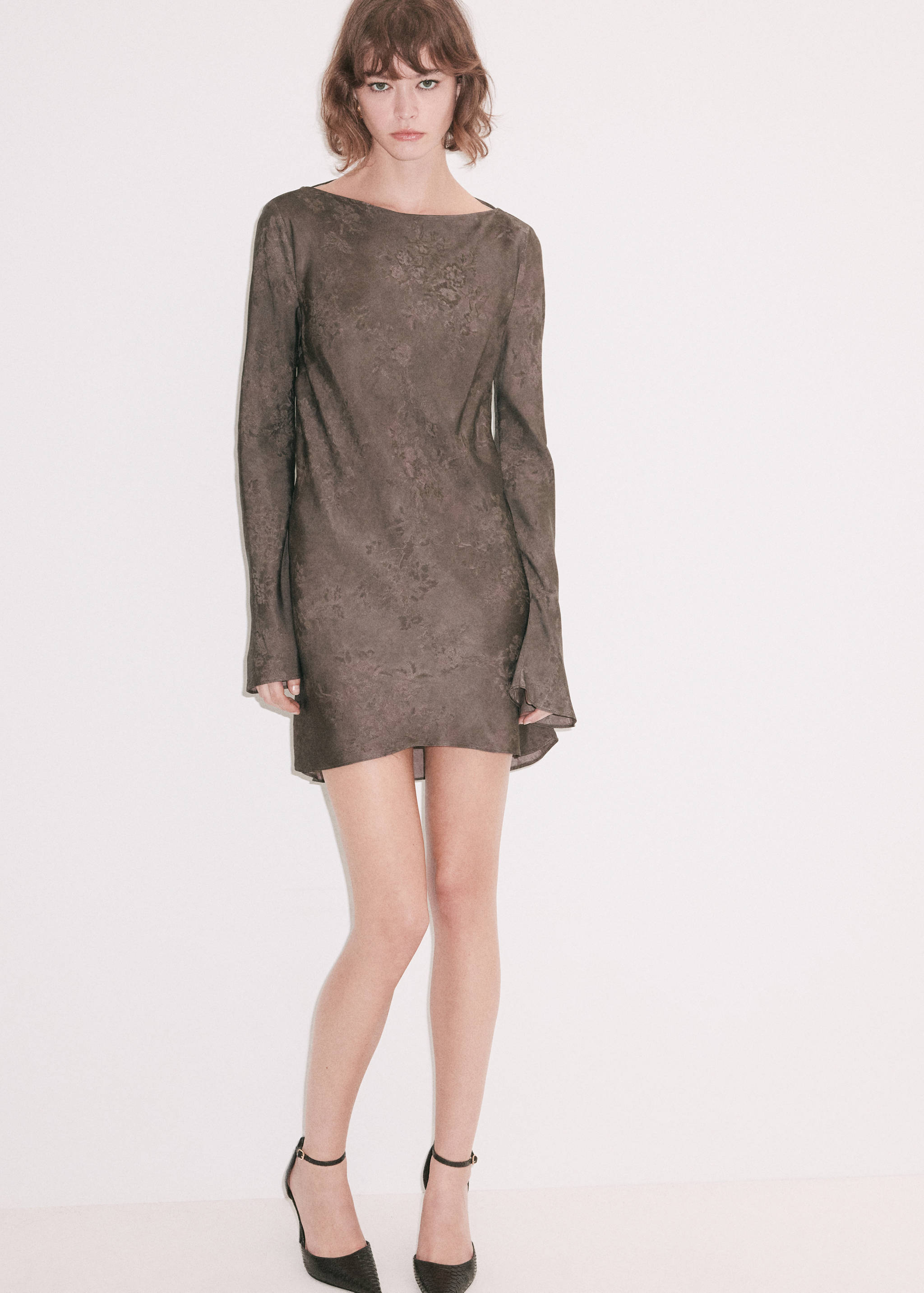 Dark taupe floral jacquard boat-neck mini dress with long sleeves.
