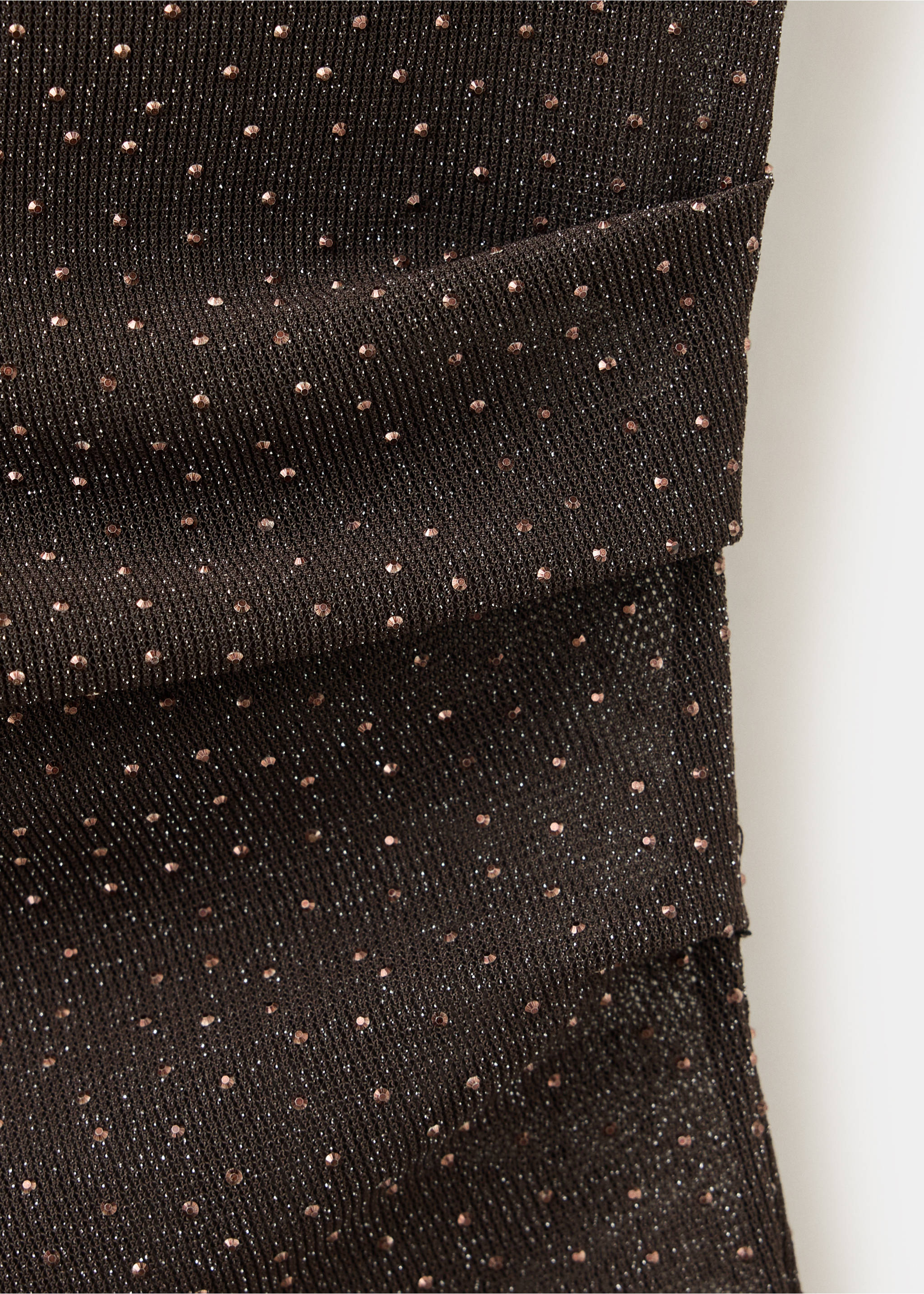Close-up of a dark brown metallic knit top with shimmering studs., Brown. Ref: 37029127-00.