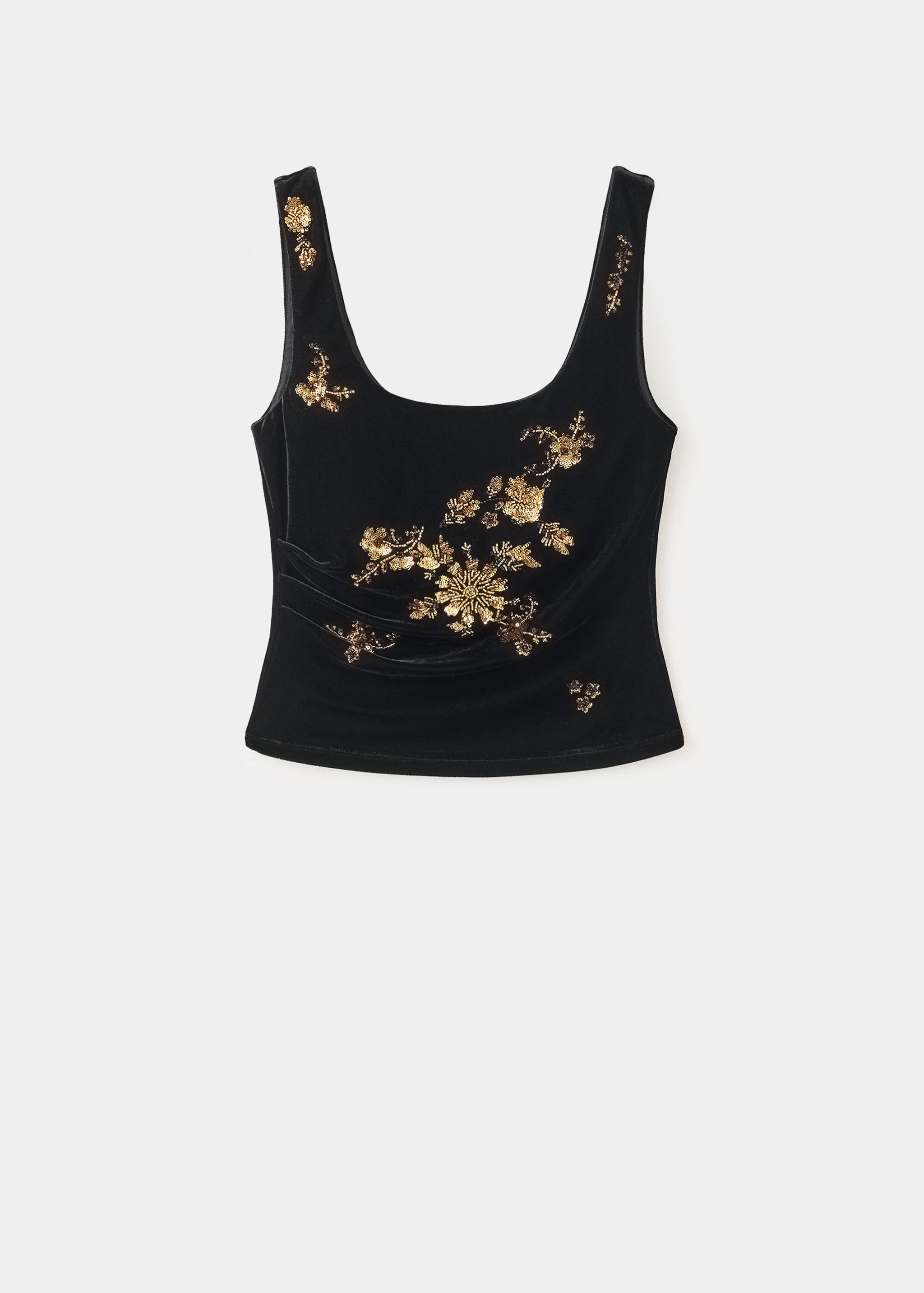 Black velvet top with a scoop neckline and gold floral embroidery.