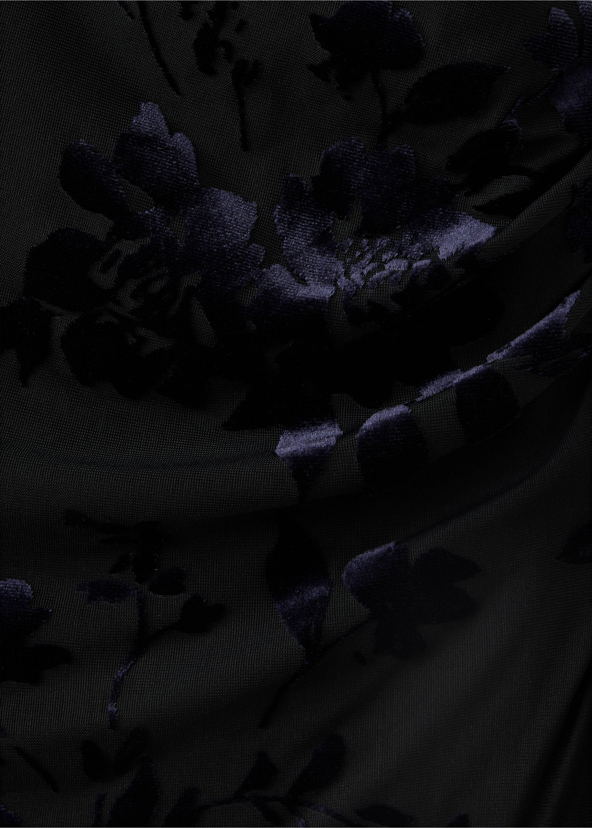 Close-up of black fabric with a dark blue flocked velvet floral pattern., Black. Ref: 37029136-00.