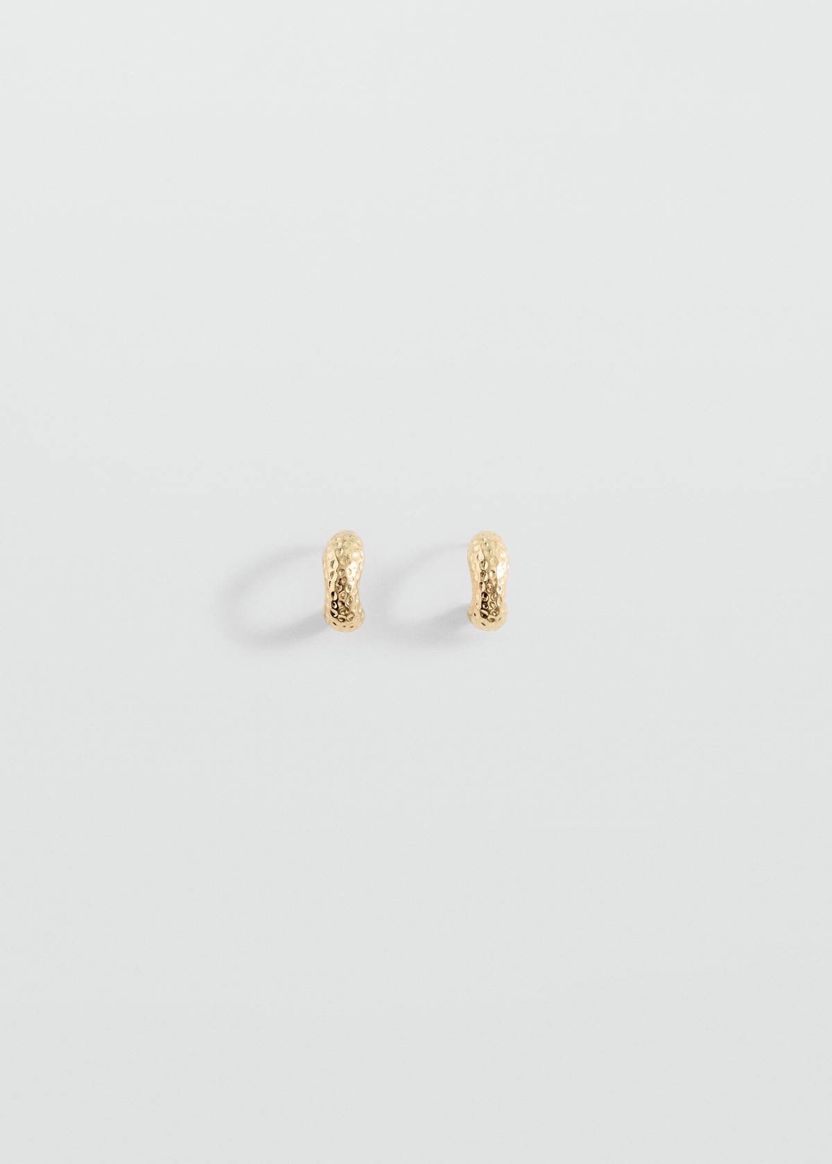 Textured hoop earrings — Gold