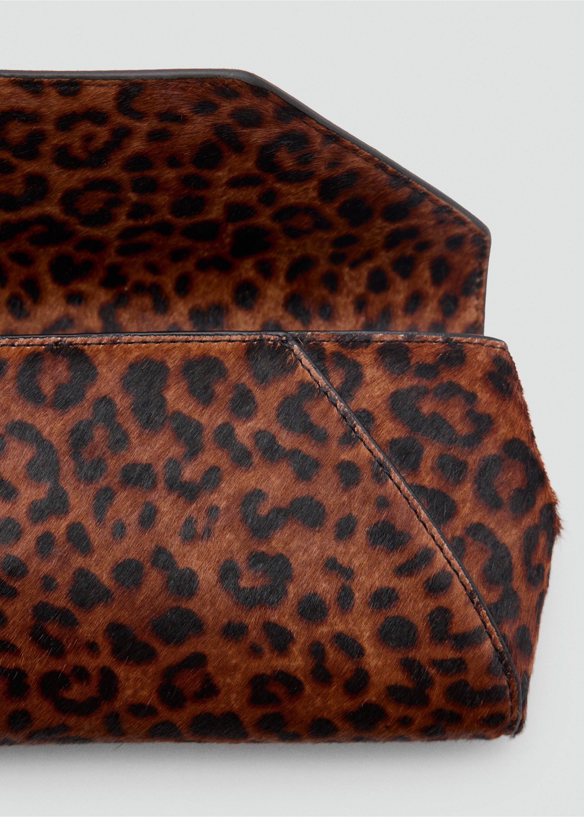 Close-up of a brown and black animal print handbag detail., Brown. Ref: 37029142-00.