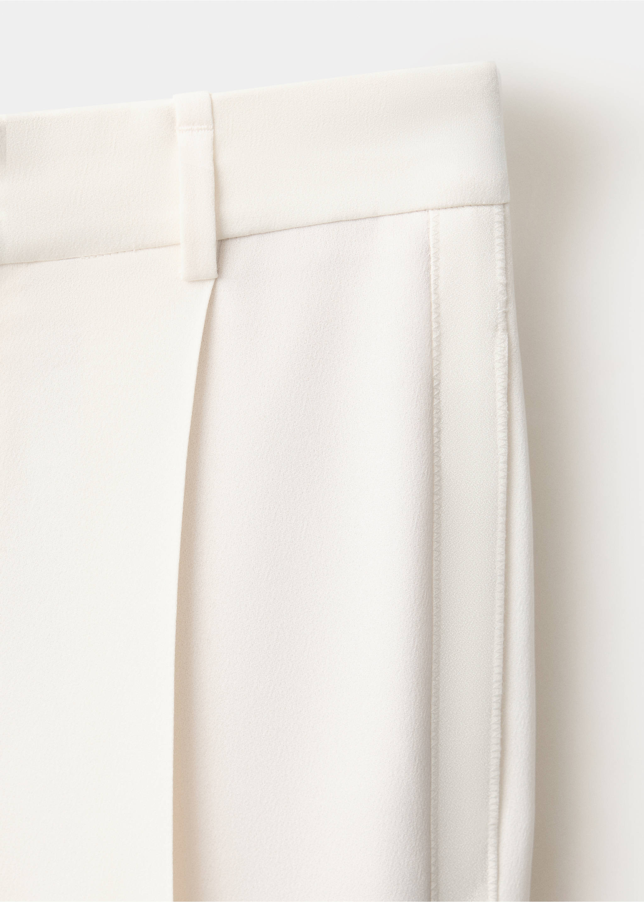 Cream trousers fabric detail showing waistband and belt loop., Ecru. Ref: 37029214-00.