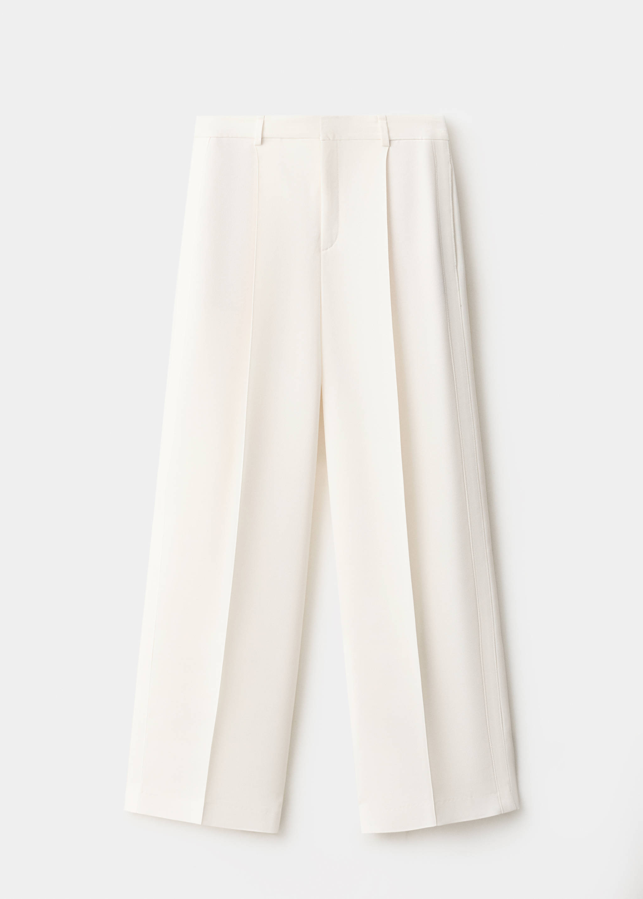 Cream straight-leg trousers with pressed center creases.