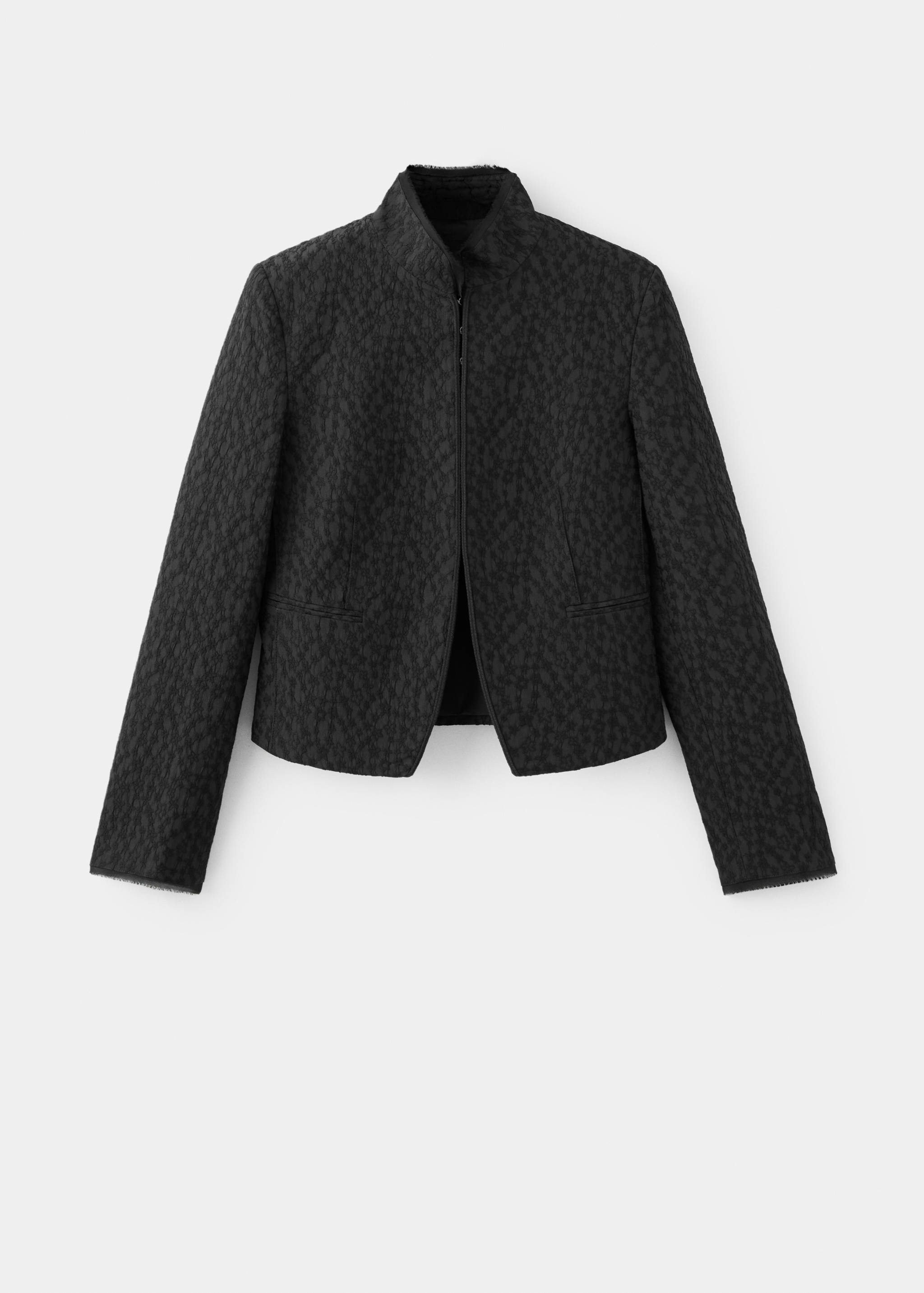 Black textured zip-up jacket with a high collar and cropped silhouette.