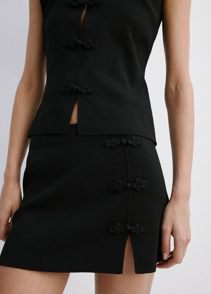Short skirt with side opening — Black