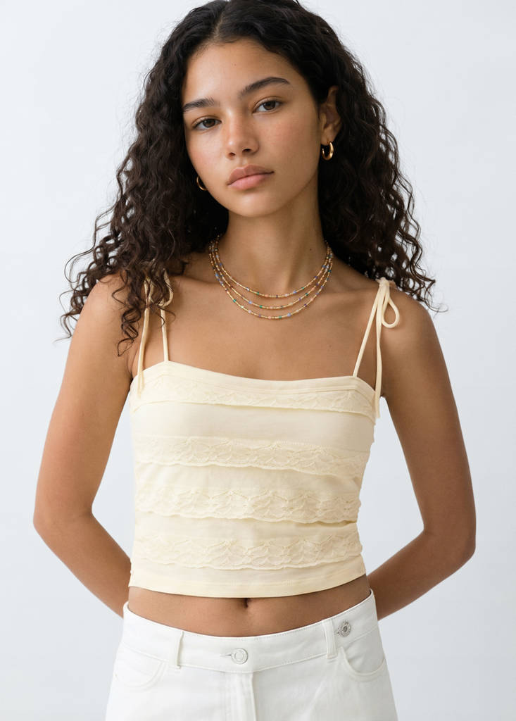 Ruffle knit top — Pastel Yellow