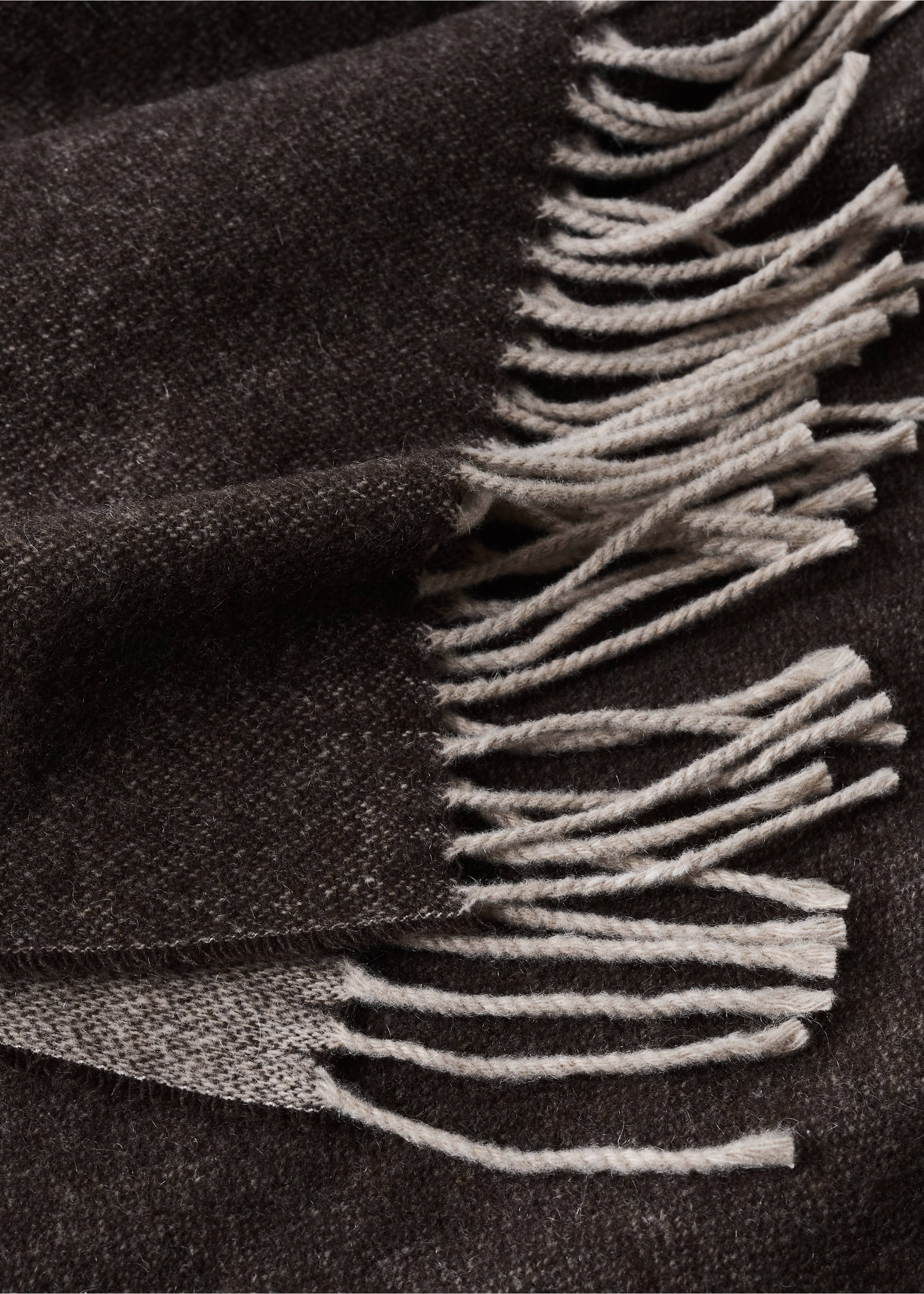 Close-up of a dark brown and beige blanket with fringe detail., Light/Pastel Brown. Ref: 37032555-00.