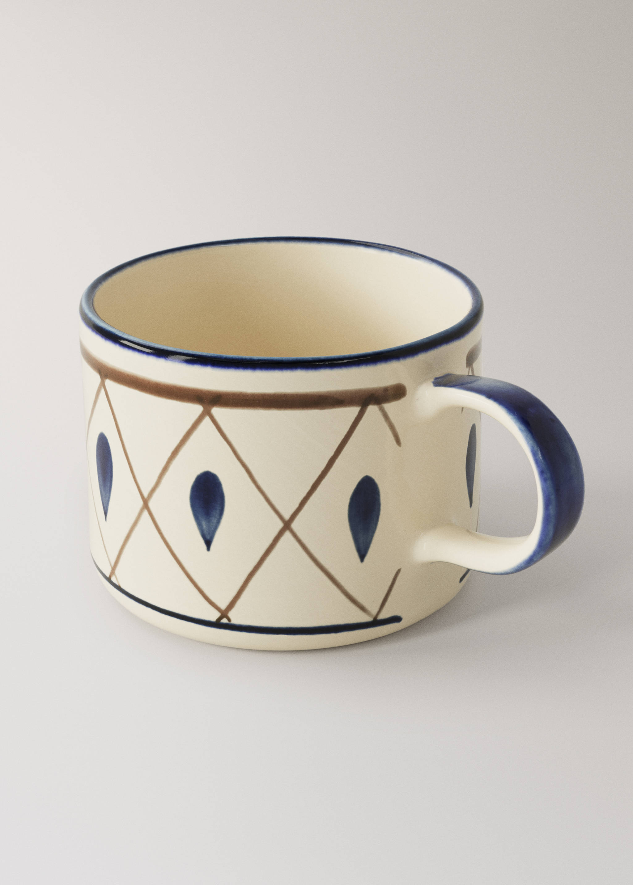 Hand-painted stoneware mug - Details of the article 2
