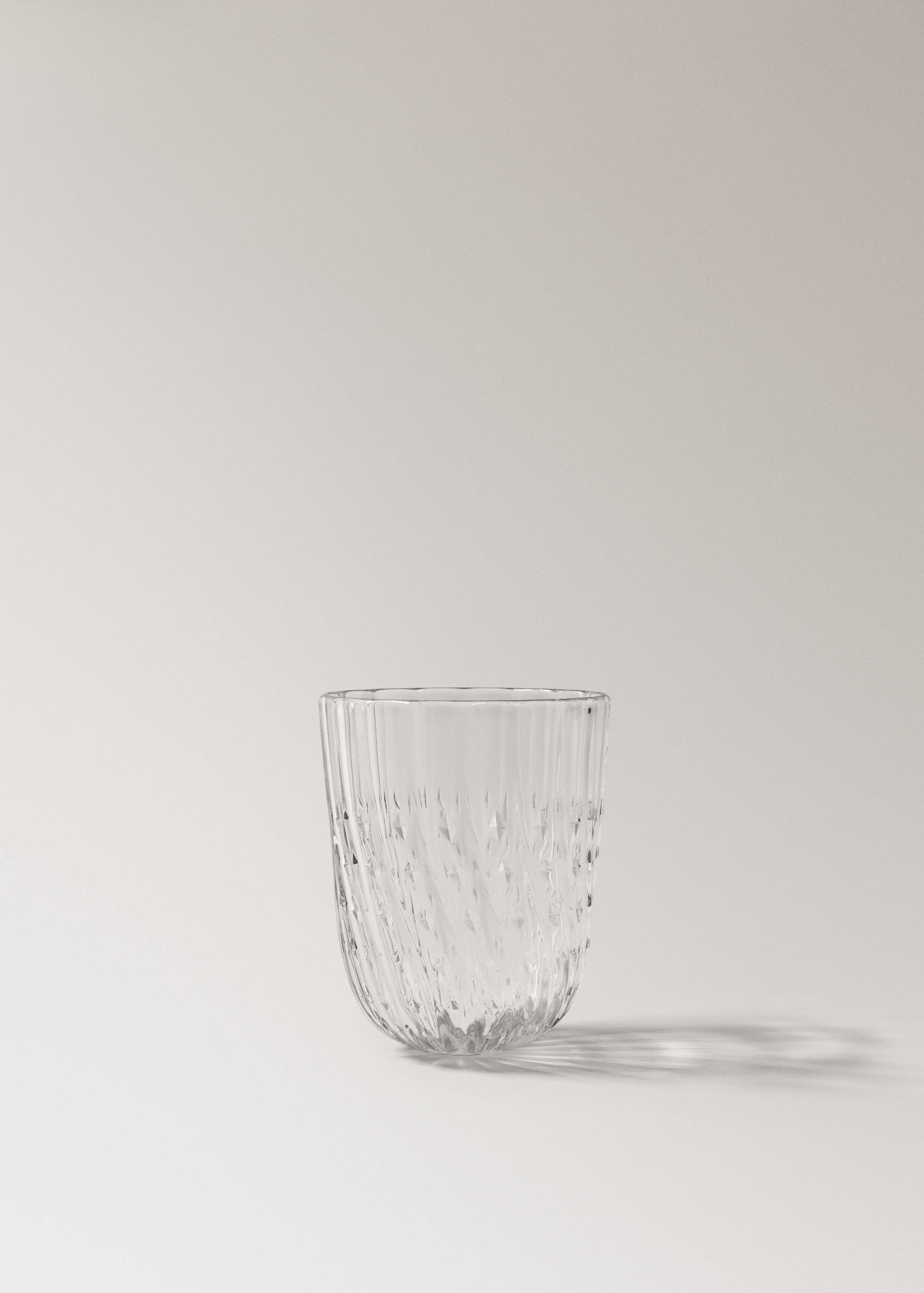 Glass cup with embossed stripes - Article without model